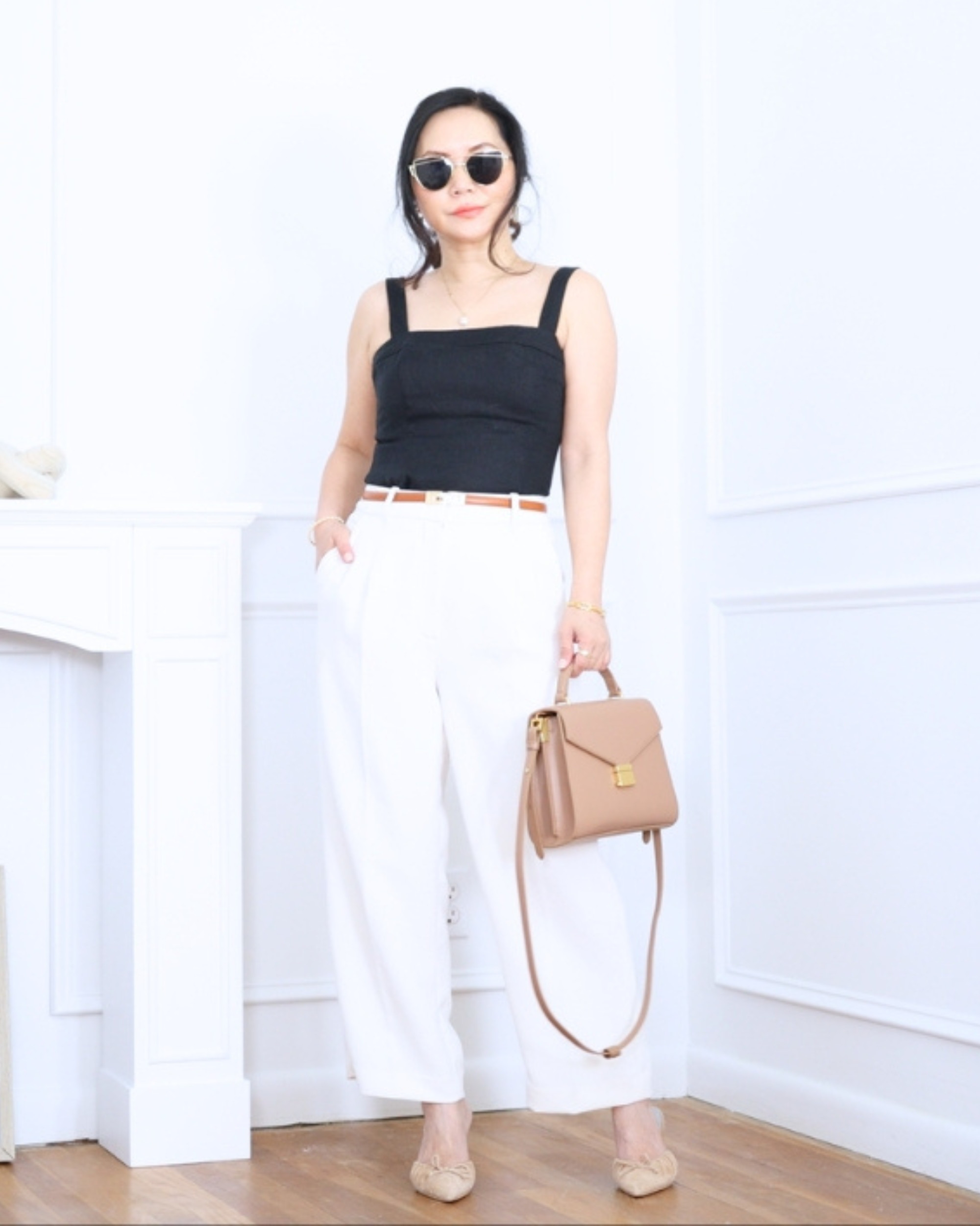 Fitted linen tank from Quince paired with white pants from Aritzia — clean, airy, and effortlessly sophisticated. A timeless warm-weather look that feels polished, comfortable, and easy to wear all day. I'm 5'2, wearing size S. 

 #LTKootd #LTKOver40 #LTKPetite