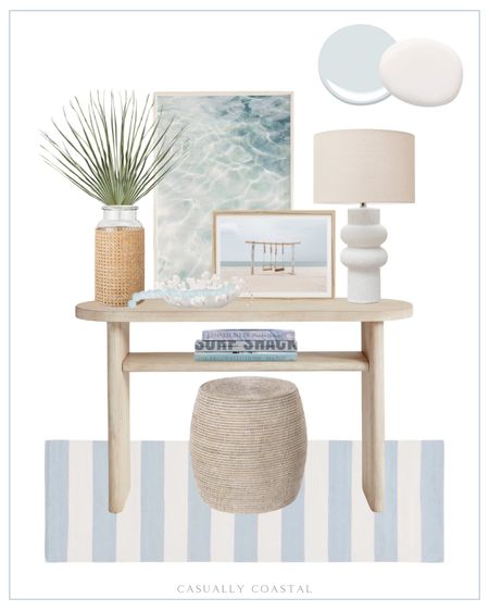 Entryway styling idea! Paint colors are BM Silver Cloud & SW Snowbound.
-
Coastal home decor, coastal entryway decor, coastal console table, coastal style, beach house decor, beach home style, coastal rug, coastal lamp, Amazon lamps, white lamps, coastal plants, faux plants, palm stems, coastal artwork, coastal coffee table books, Amazon coffee table books, decorative books, Amazon decorative books, decorating book, glass beads, coastal decorative glass beads, seaglass beads, rattan accent stool, woven stools, striped rug, entryway rug, hallway runner, blue & white rugs, affordable rug, Amazon lamp, table lamp with linen shade, coral textured decorative bowl, Amazon decorative bowl, Amazon home decor, Mexican fan palms, glass vase, coastal vase, cane vase, beach swing print, coastal wall decor, coastal artwork, ocean waves art print, neutral console table, foyer table, foyer decor console table with shelf, light wood console table, pottery barn console table, summer home decor, home accessories 

#LTKFindsUnder100 #LTKFindsUnder50 #LTKHome