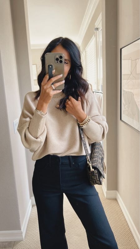 Love this Amazon sweater! I own it in multiple colors and it’s lightweight enough to wear through spring, StylinByAylin 

#LTKunder50 #LTKSeasonal #LTKstyletip