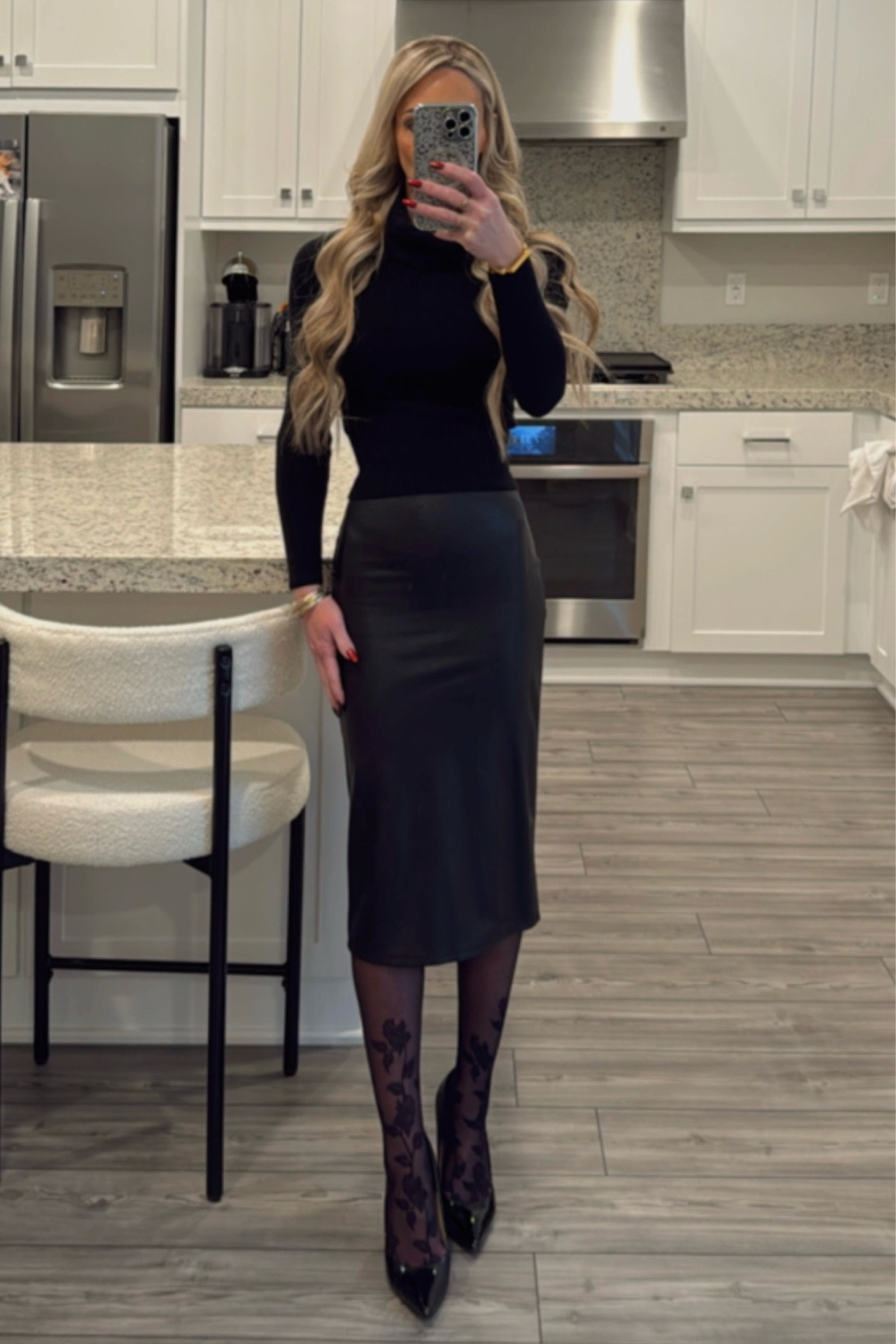 Black faux leather skirt, sweater and pattern tights  

#LTKStyleTip #LTKWorkwear