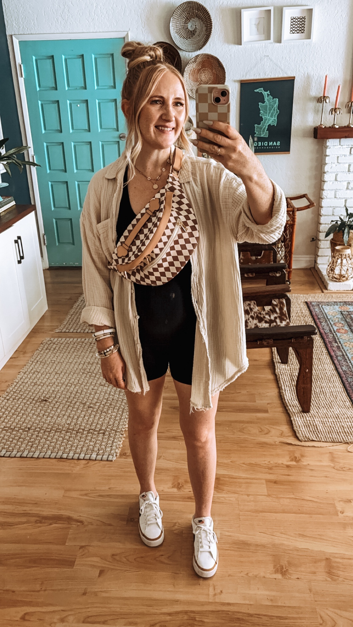 Easy summer mom outfit today ☀️
Black romper, Nike sneakers and the softest gauze button down from
aerie! 

Summer look, summer style, summer ootd, momiform, easy style, casual look, capsule wardrobe, summer capsule, romper, Nike, bum bag, crossbody bag, look for less

#LTKStyleTip #LTKFindsUnder50 #LTKFindsUnder100