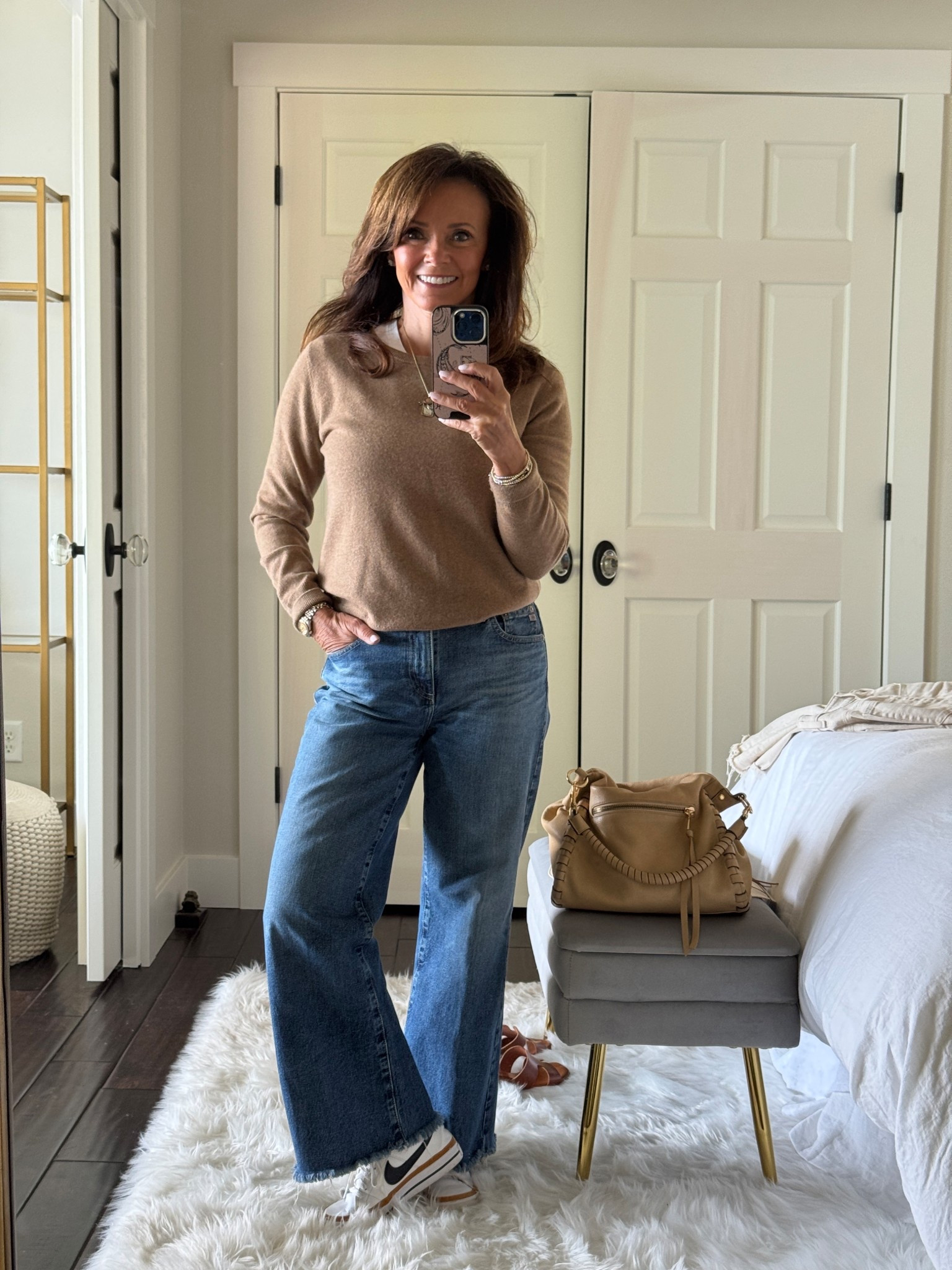 Classic camel cashmere sweater
Denim
Retro Sneakers 
Leather handbag 
kimbentley, fall outfit 

#LTKSeasonal #LTKItBag #LTKShoeCrush