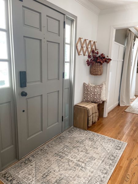 This years fall entry…
I also gave my front door a fresh coat of paint in the color CASTLEMOSS from @schnubitup . It is an almost identical color to my upper office walls- BM Taiga.  

How the lower level flows so much better. 

#LTKhome #LTKstyletip #LTKSeasonal