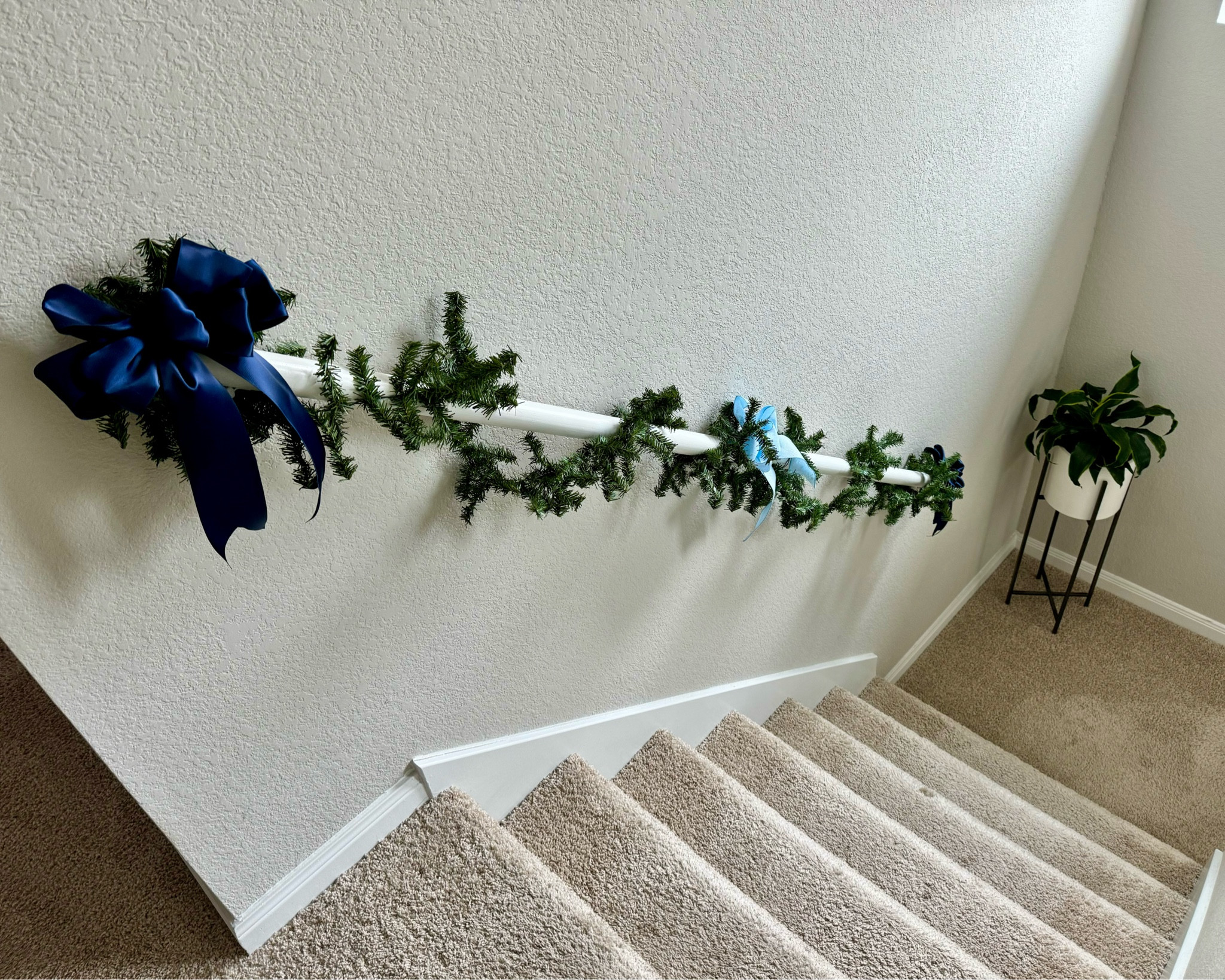 Homemade Christmas garlands on the staircase 🥰🎄❄️💙

#LTKSeasonal #LTKHoliday #LTKhome