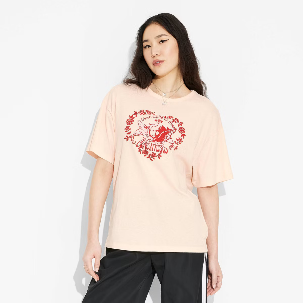 Women's Guns N' Roses Oversized Short Sleeve Graphic T-Shirt - Light Pink | Target