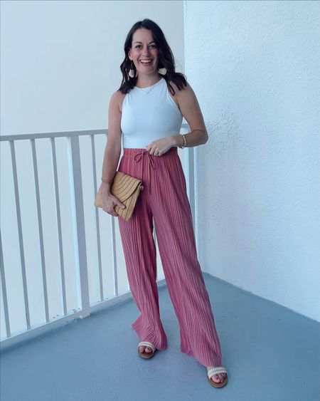 Amazon wide leg pants (true to size - I’m wearing a small), amazon bodysuit (runs tts to small - I’m wearing g a small), target sandals (Tts to small), amazon straw clutch 

Vacation outfit, resort wear, spring break, spring outfit

#LTKSeasonal #LTKunder50 #LTKtravel
