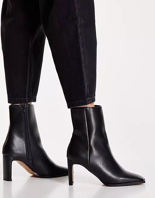 ASOS DESIGN Remmy set-back heeled boots in black | ASOS (Global)