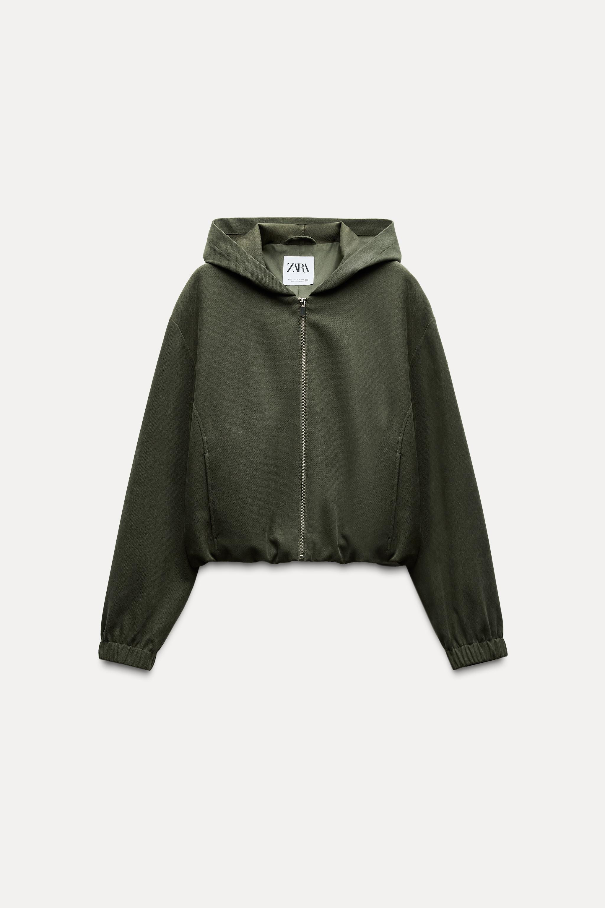 Bomber jacket with hooded collar, long sleeves, and elastic cuffs. Front welt pockets. Interior l... | Zara US