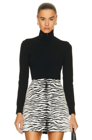 ALAÏA Minimalist Turtleneck in Noir - Black. Size 34 (also in ). | FWRD 