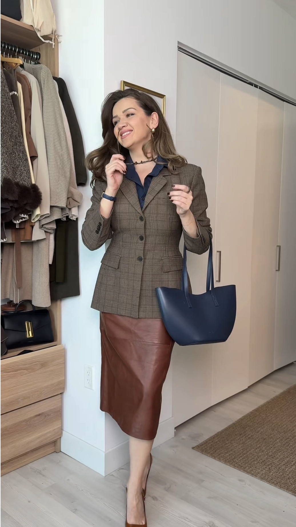 Look 1 details 💼

I cannot tell you how GOOD I feel in this look! The blazer beautifully cinches in the middle - truly pictures/videos don't do it justice. This one is expensive - I literally have been eyeing it for months now and finally decided to get it - so glad I did! Wow! Worth the $!

The skirt was PR from Sezane and genuinely is just incredible. 100% leather, sdo you know it will last and age beautifully - such a staple color too. 

The details are below - I have linked similar options too 🤎

Blazer: Aritzia size 8 (true to size)
Navy fake collar: Amazon
Skirt: Sezane 6 (sold out)
Heels: Amazon 8.5
Bag: Calpak 
Watch: Porsamo Bleu
Glasses: Amazon 
Earrings: Amazon 

 

#LTKMidsize #LTKTall #LTKWorkwear