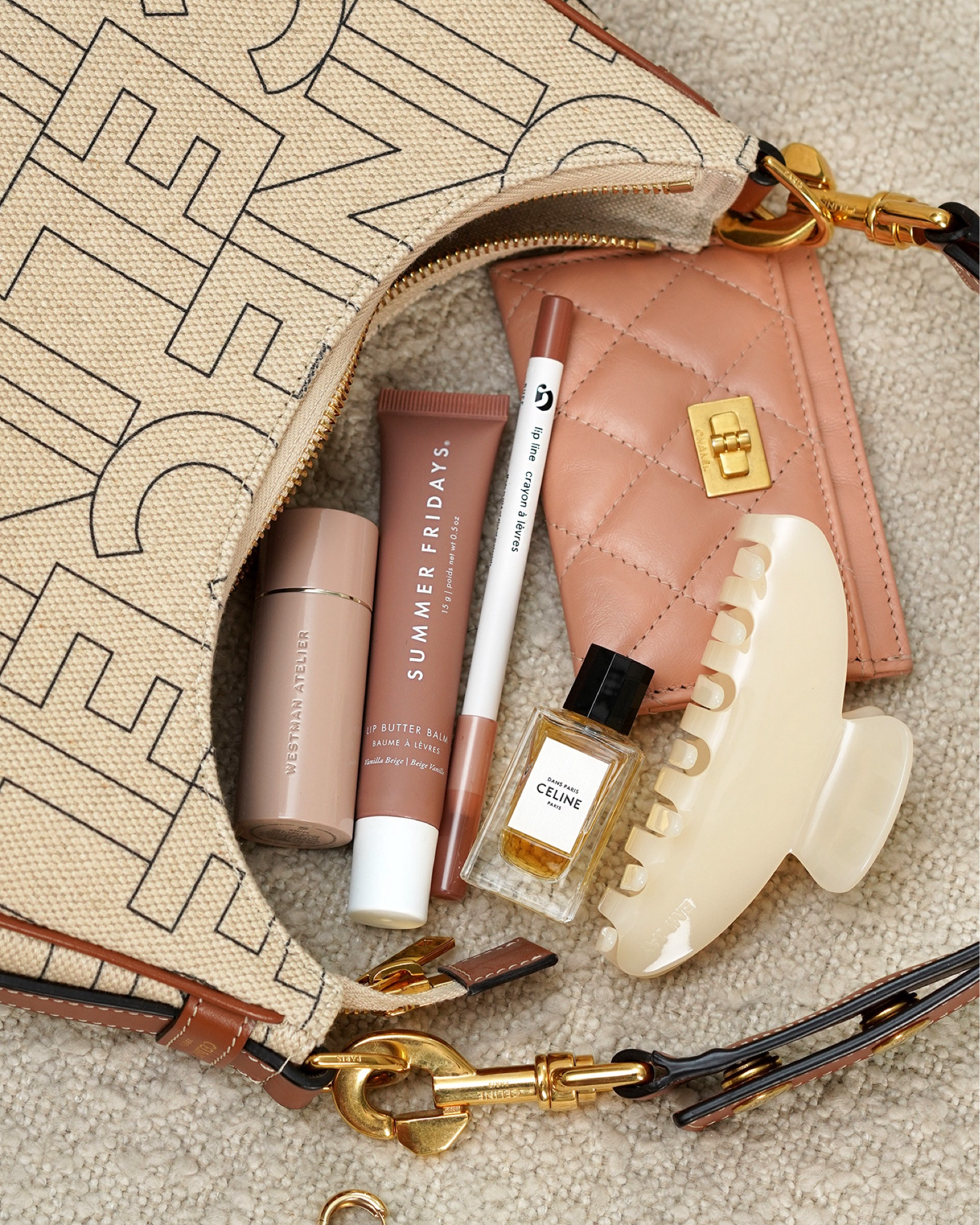 Celine Ava bag
Westman Atelier Lip Suede
Summer Fridays Vanilla Beige
Glossier Lipliner in Buff
Celine mini perfume
Emi Jay hair clip
Chanel card case

#LTKBeauty