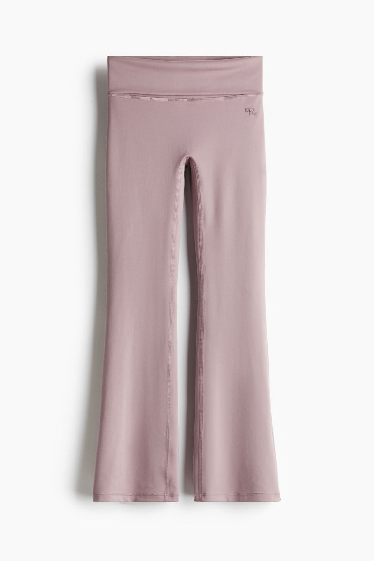 H & M - Flared sports leggings in SoftMove - Purple | H&M (UK, MY, IN, SG, PH, TW, HK)