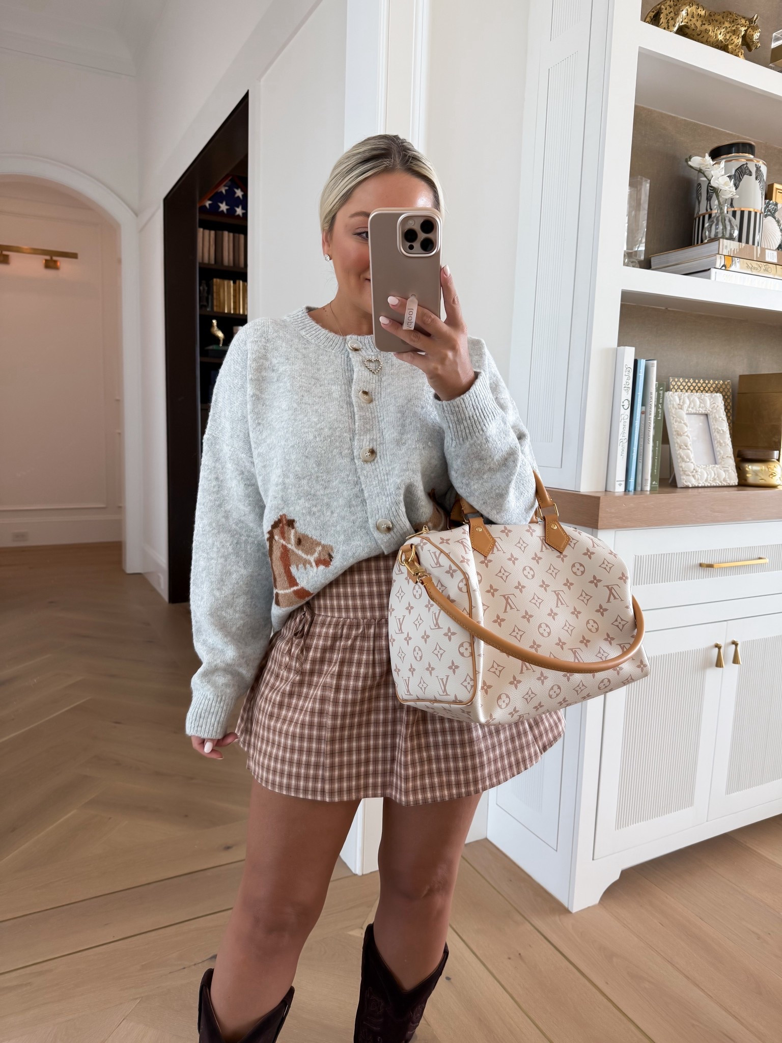 The cutest fall look! I ordered size small in skirt but wish I had a medium! Size medium in cardigan - use code WHITNEY for 30% off my outfit  

#LTKFindsUnder100 #LTKWorkwear #LTKStyleTip