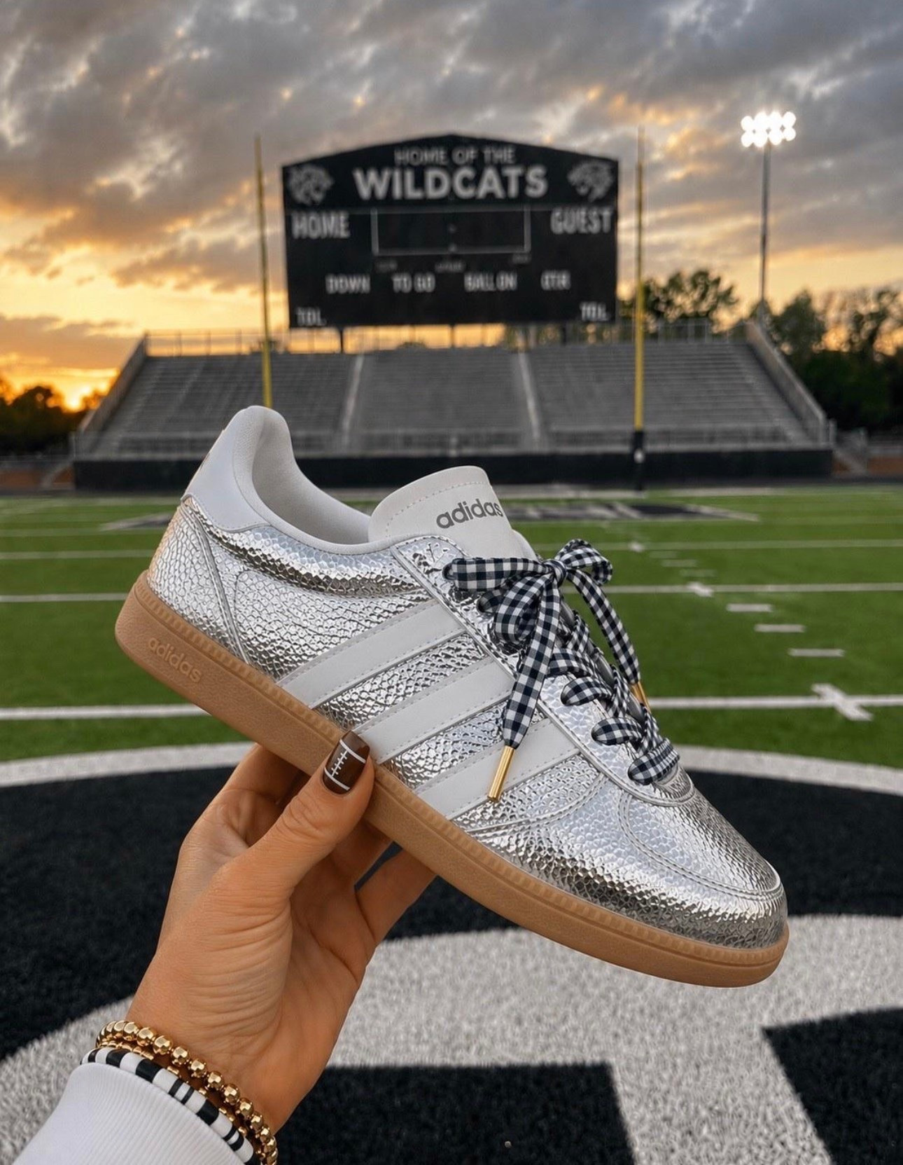 The metallic silver of this Adidas Breaknet Sneaker is going to make a statement for your Game Day style. Best part these can transition into your favorite teams by changing up the laces!

#LTKdayinmylife #LTKgrwm #LTKootd