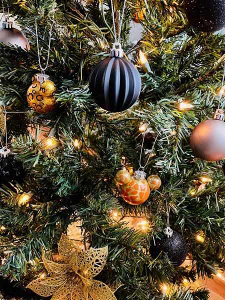A black and gold mini Christmas tree 🖤💛
 
#holidaydecor #smallspacedecor #christmasdecor

#LTKHoliday #LTKSeasonal #LTKfindsunder100