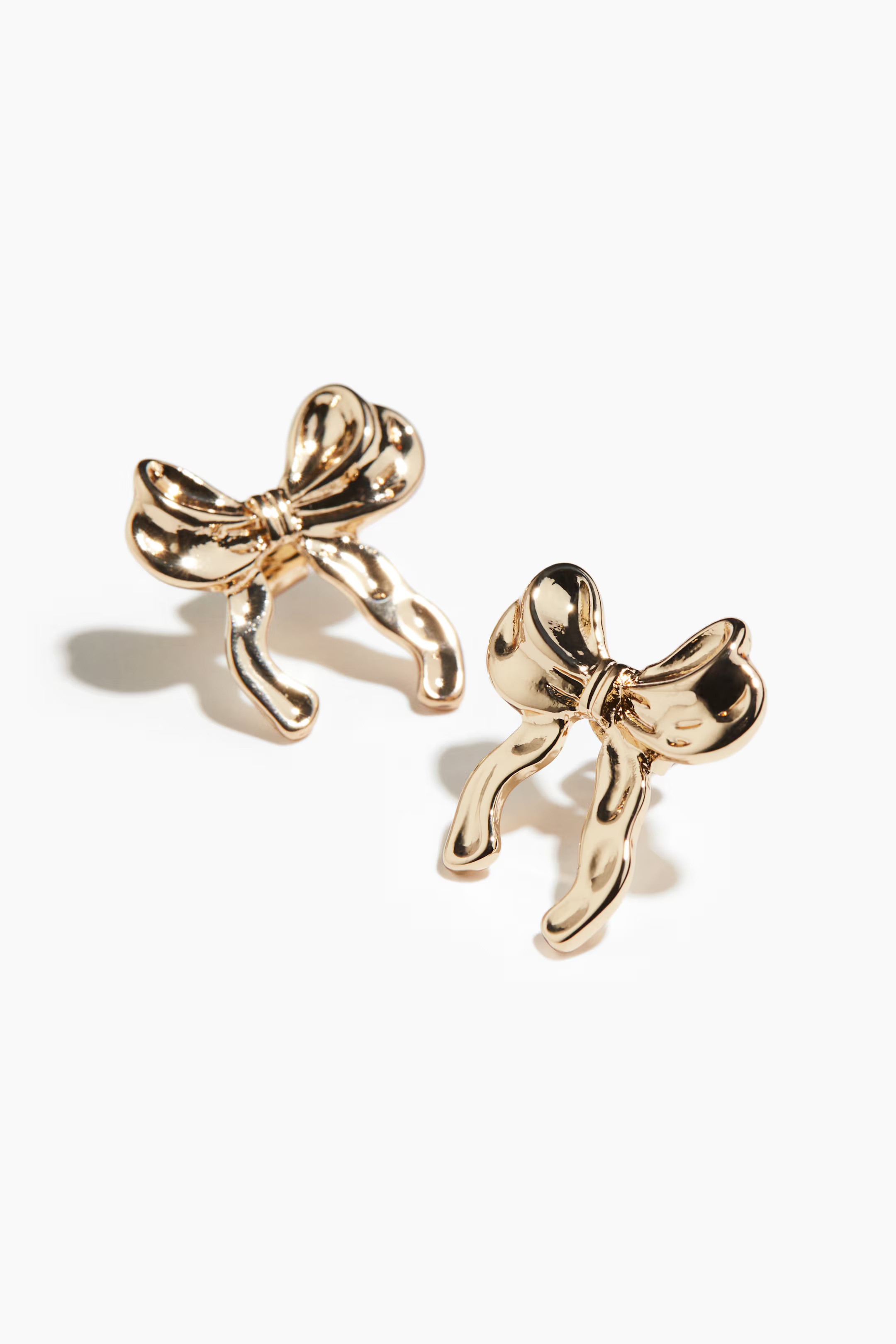 Orecchini a bottone a forma di fiocco | H&M (FR, IT, ES, PT, BE)