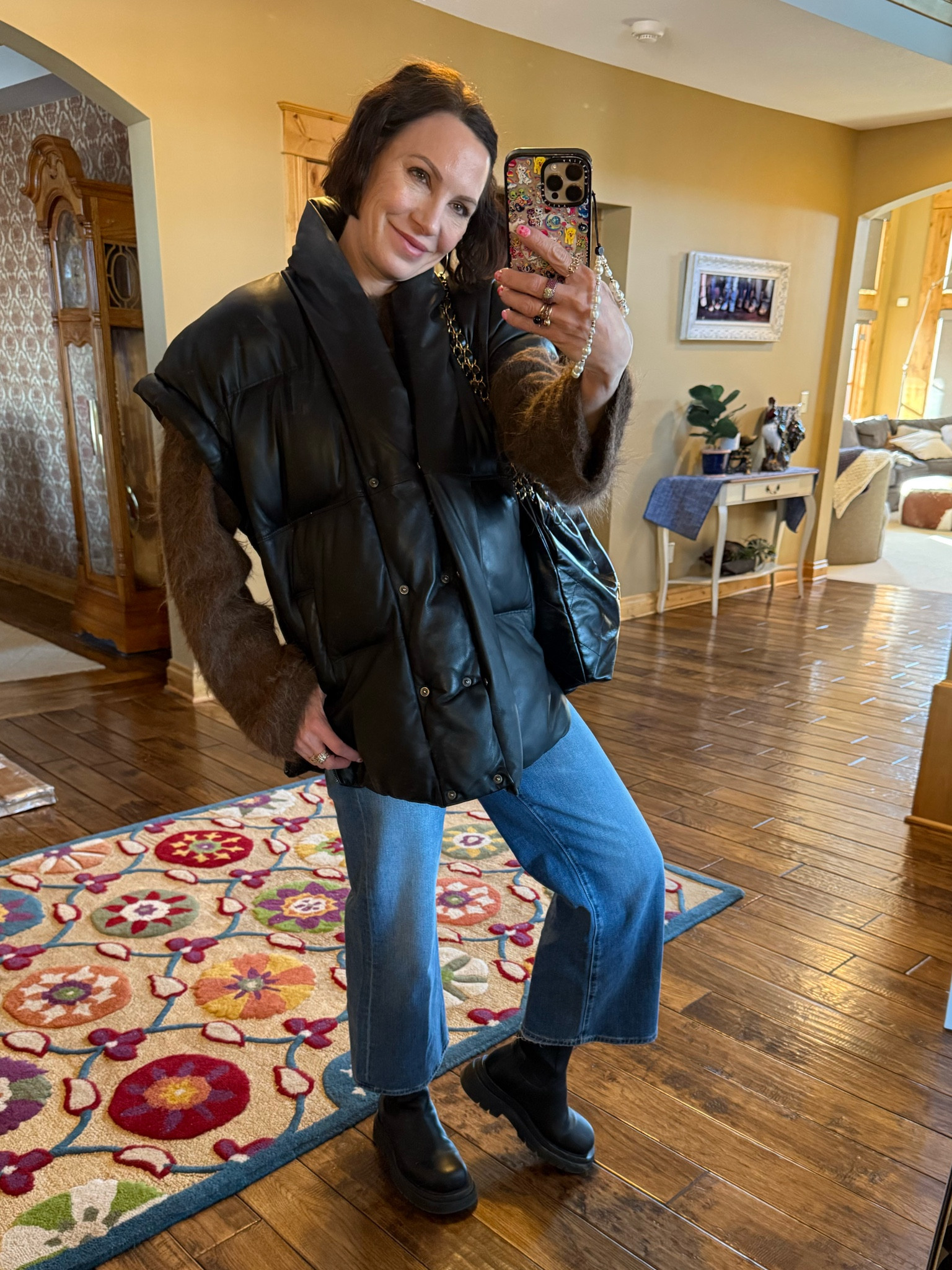 Winter outfit inspo- oversized sweater, vest, cropped jeans and boots. 

#LTKOver40 #LTKSeasonal #LTKStyleTip