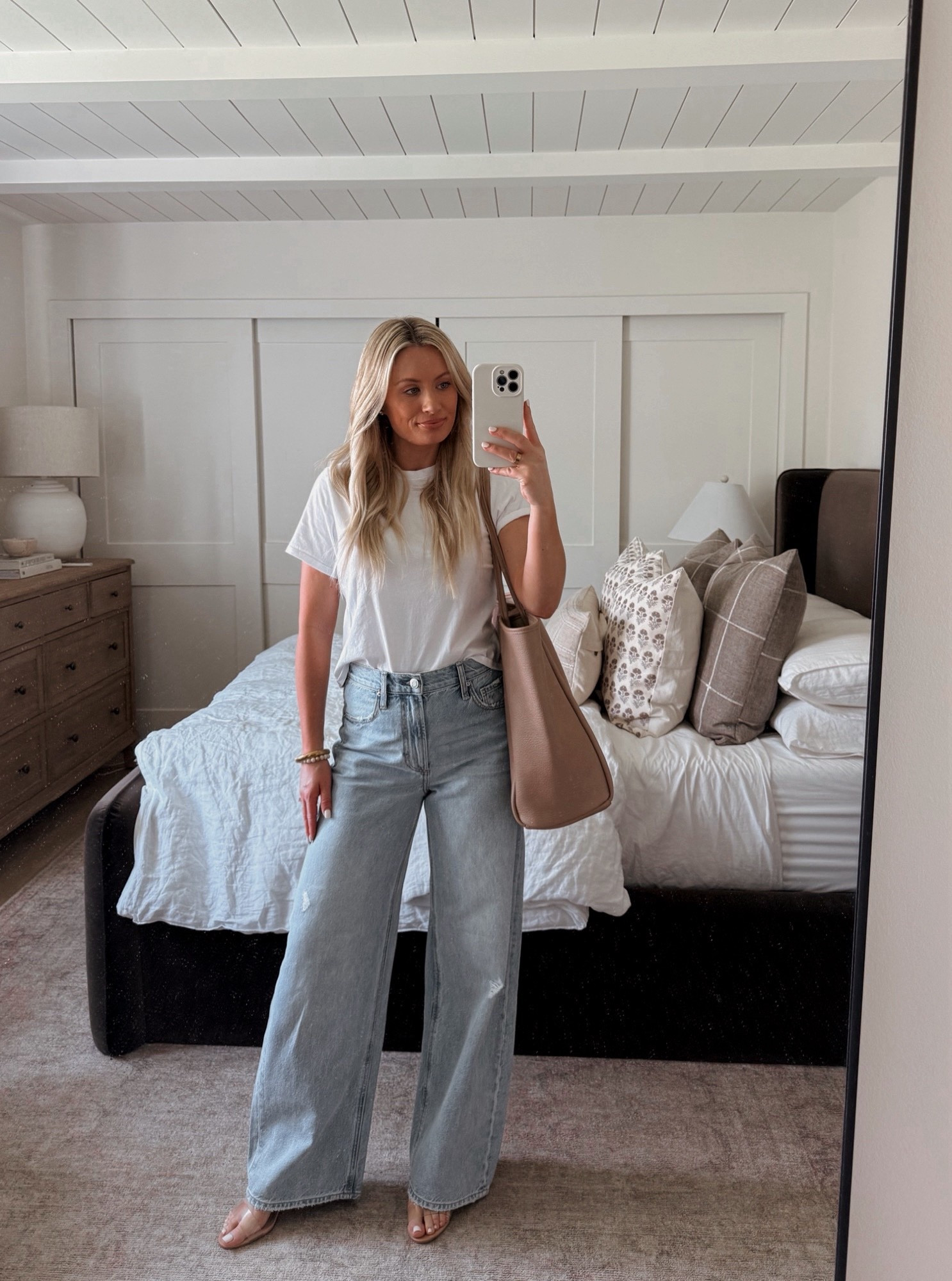Love these capsule wardrobe basics. I ordered these jeans in the denim and white color. The perfect fit! So comfy too. 
Shirt: small
Jeans: 25 

#LTKPetite #LTKSeasonal #LTKWorkwear