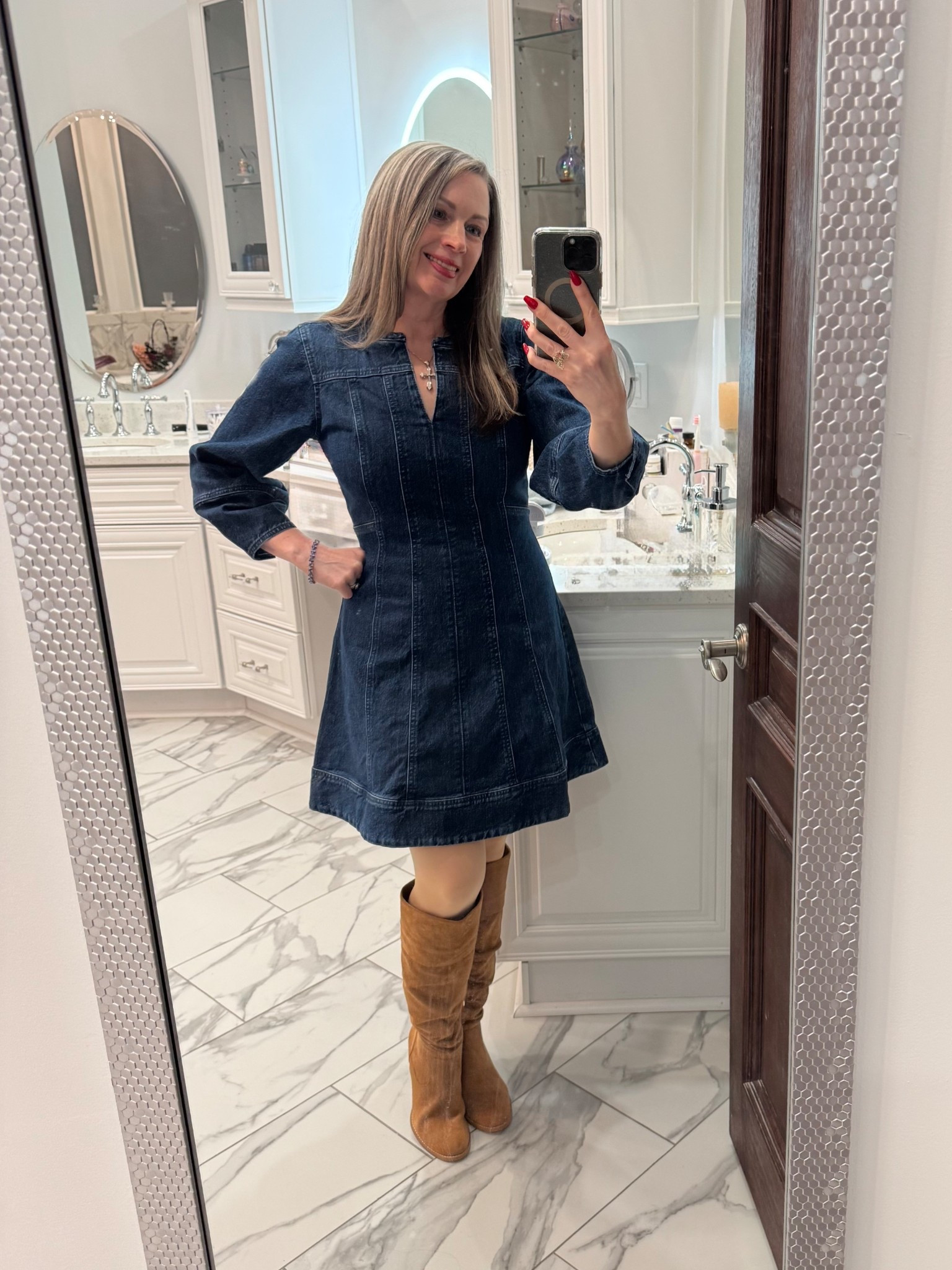 This is my New Year’s Eve outfit. 
I wanted something casual, comfortable, and fun. The barrel sleeves keep my outfit on trend, and the a-lone silhouette is classic.
I like that this dress has some stretch to it. It zips up the back. The V-neck is not too low for me. It opens just enough to let your favorite necklace peek through. I love how the entire dress is pieced with panels and stitched together. It adds interest to the look. 

I’ve worn these tights so many times, I’m so glad they come in a pack of two. Not too thick, not too thin. They have a little boost for the booty. They are not control top and are very comfortable.

My boots look like suede. The stitching is really nice. They are well-made, true to size. 

denim dress, faux suede boots


#LTKgrwm #LTKootd

#LTKOver40