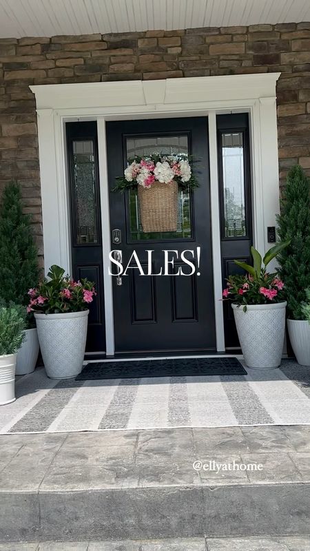 Summer porch styling sales! Shop my hanging basket on sale, scroll doormat on sale, lightweight planters, faux potted trees and plants, more planters. Summer porch accessories. 

#LTKHome #LTKSaleAlert #LTKVideo