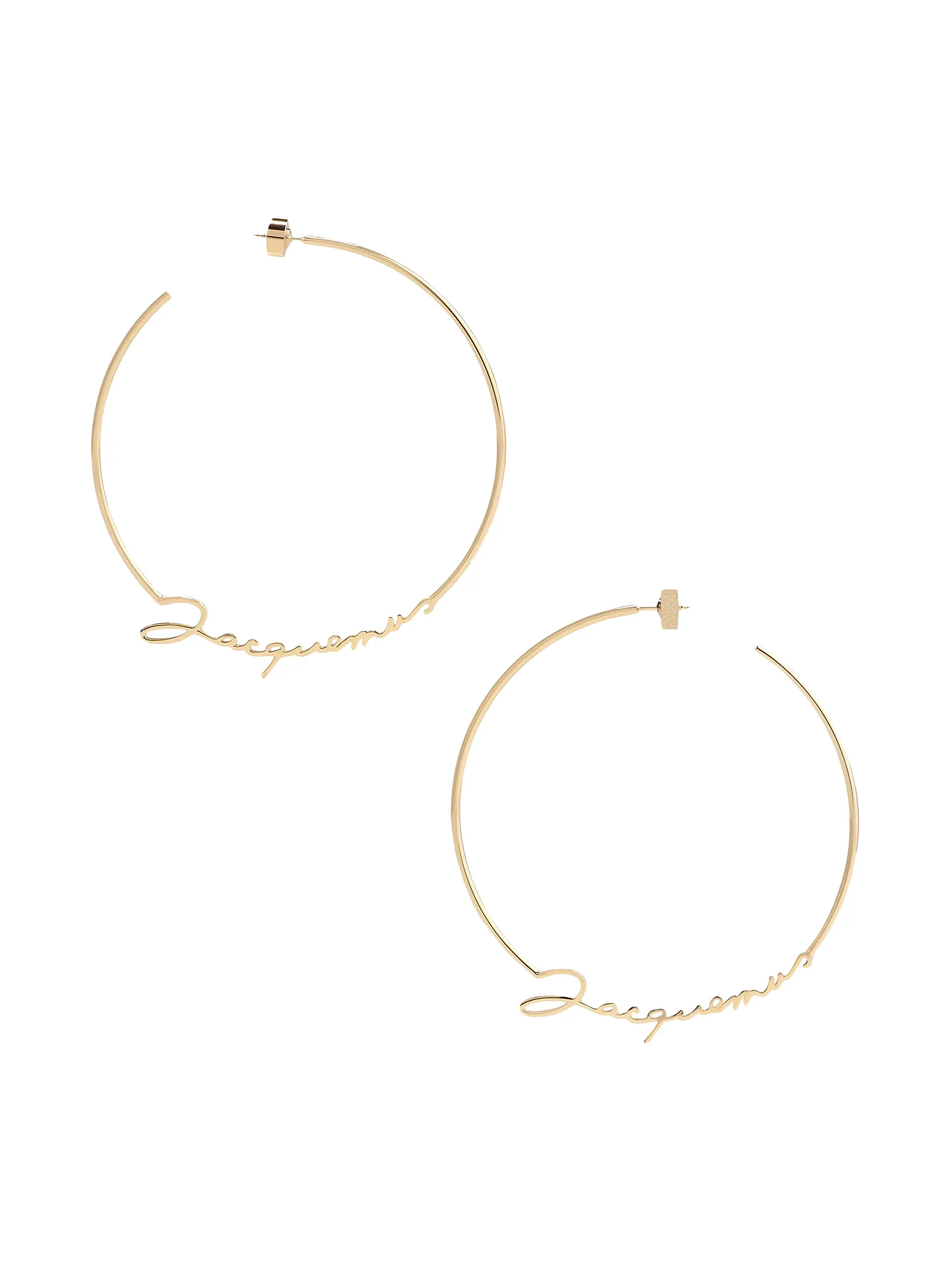 Shop Jacquemus Unisex Logo Brass Hoop Earrings | Saks Fifth Avenue | Saks Fifth Avenue