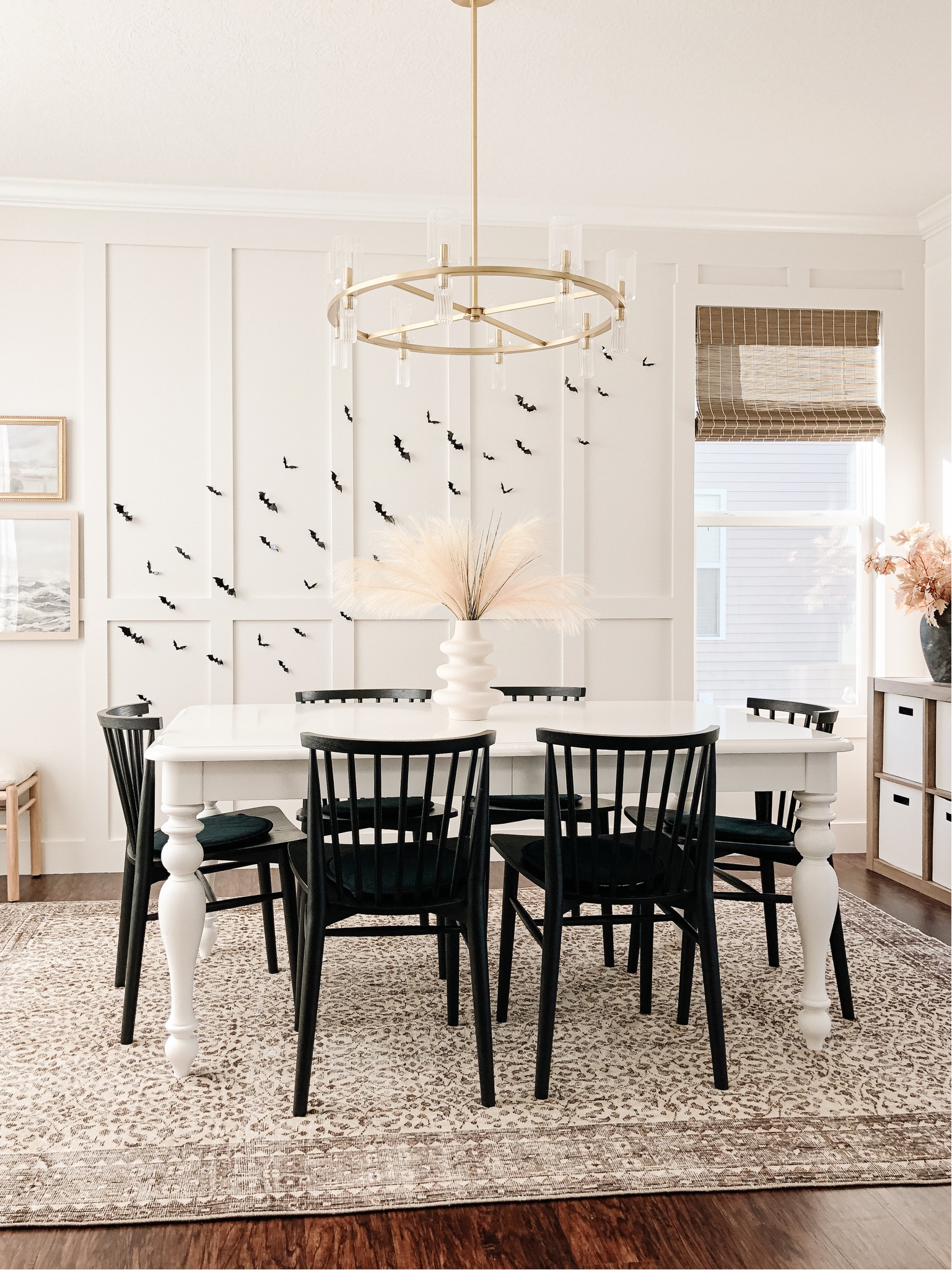 Minimalist modern halloween dining room with bats on wall 🦇 

#LTKhome #LTKSeasonal #LTKHalloween