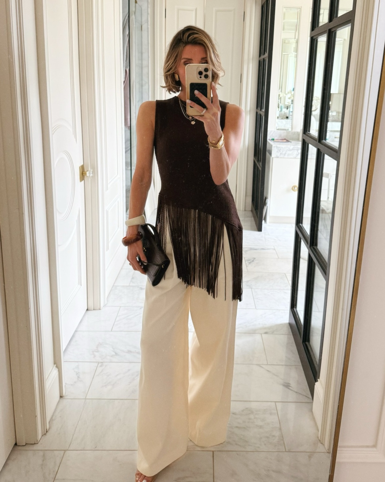 A little texture for spring ✨ This new fringe top from @Zara proves chocolate brown is the softest way to do a darker neutral this season.

#LTKootd