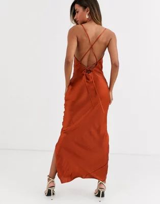 ASOS DESIGN cami maxi slip dress in high shine satin with lace up back in rust | ASOS (Global)