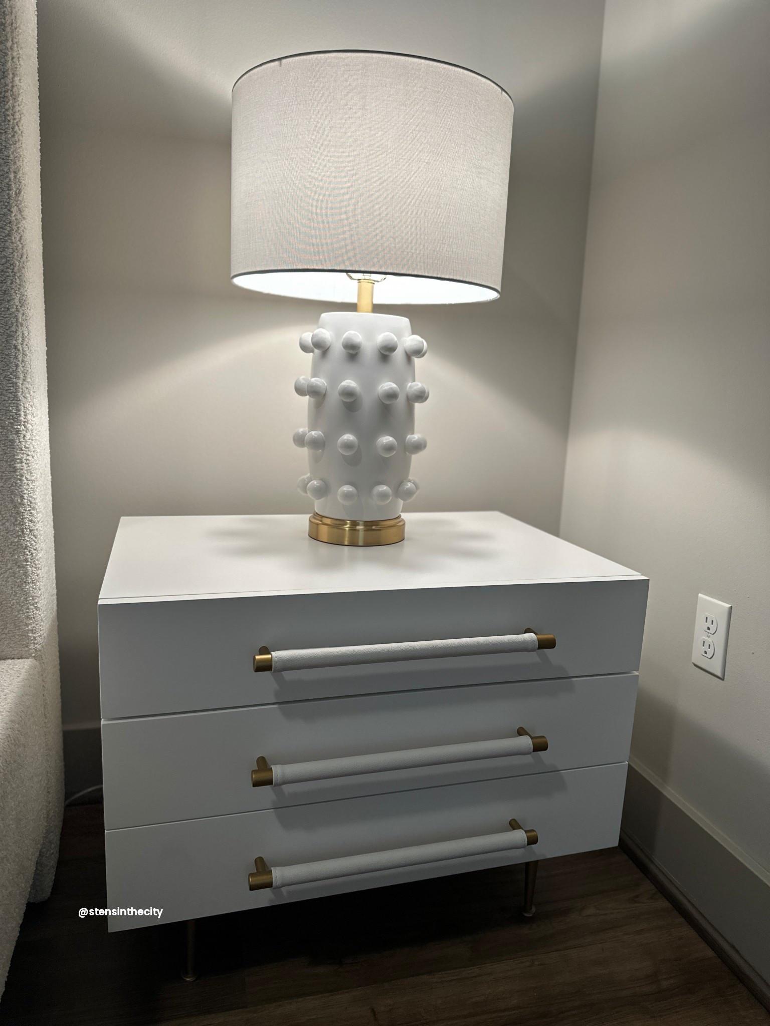 New bedroom setup! Super easy to assemble both... did it by myself! Obsessed with this all-white look for my apartment! Note: Both come in other colors 
_
TOV furniture, black and gold nightstand, grey and gold nightstand, navy lamp, white nightstand, white lamp, cool white lamp, trendy nightstand, apartment furniture, white and gold furniture, home decor, apartment decor

#LTKHome