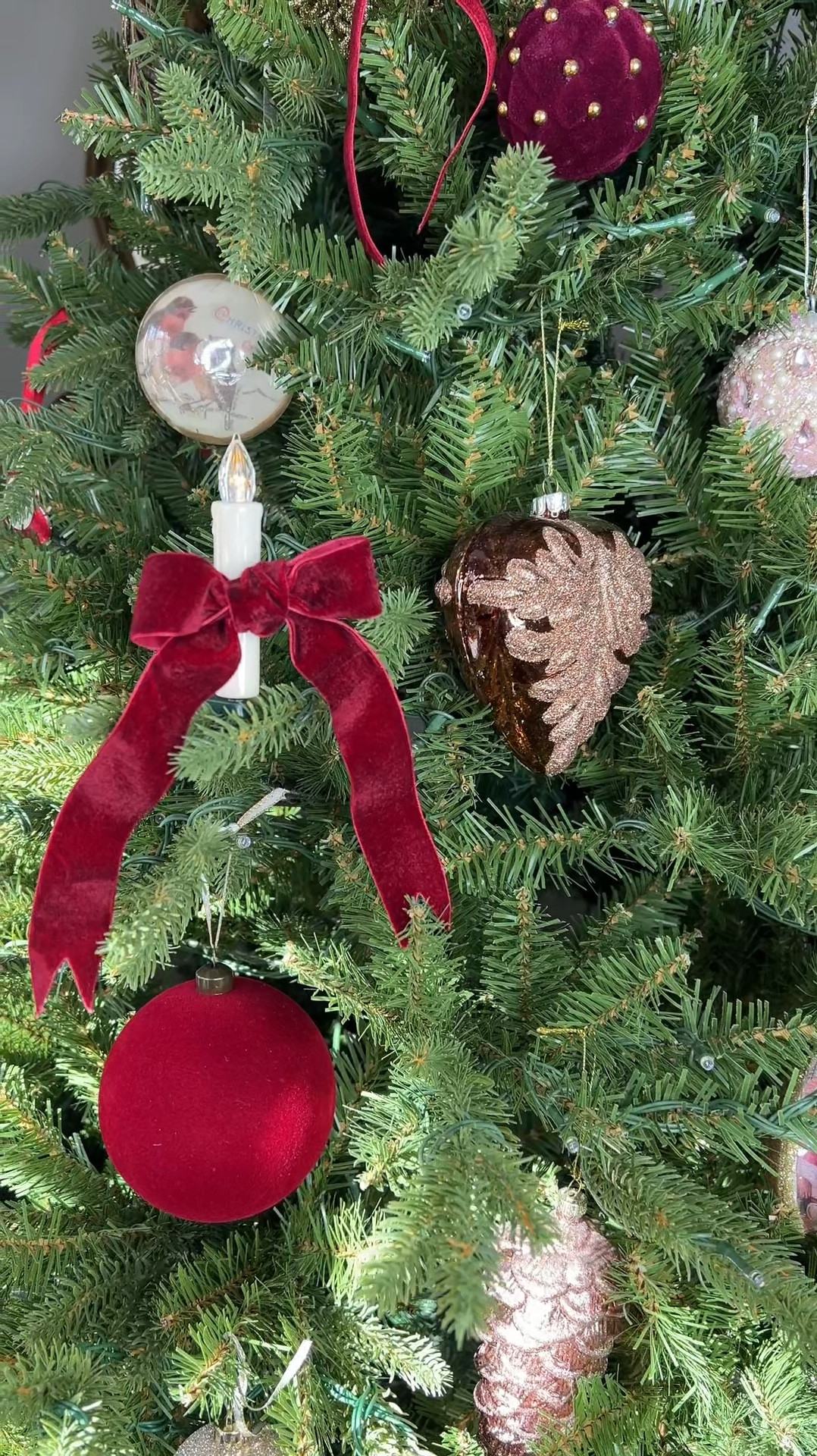 Add a velvet bow! 

Battery operated tree clip-on candles needed a little extra something.  So, I decided to tie velvet ribbon into a bow on each one! 

#LTKFindsUnder50 #LTKHoliday #LTKSeasonal
