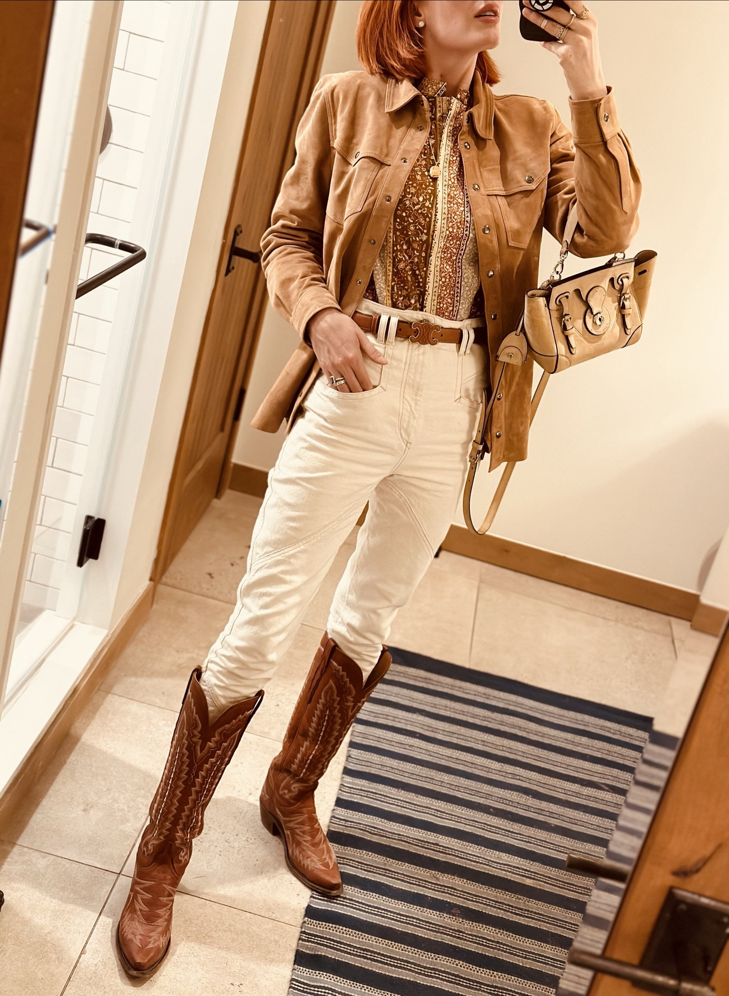 As much as I wanted to ski today and see the kids at ski school, I have really missed our date nights recently so today we made it a day for ourselves. We started the day with a tour of federal public land and did a short hike and then went to an amazing lunch at The Compound and shared some entrees and a bottle of wine. I wore this look for all of it and am planning to carry on through dinner. 
I have had this Anine Bing suede shirt for years and never found the right way to wear it but I just got this new shirt to layer with it and it’s perfect. 
Comment for you that I told my mom and my BFF- these boots are all you need. If you have one pair, this is the pair. 
I have loved having this belt to match it (you know I love to match). 

#LTKHoliday #LTKtravel #LTKworkwear