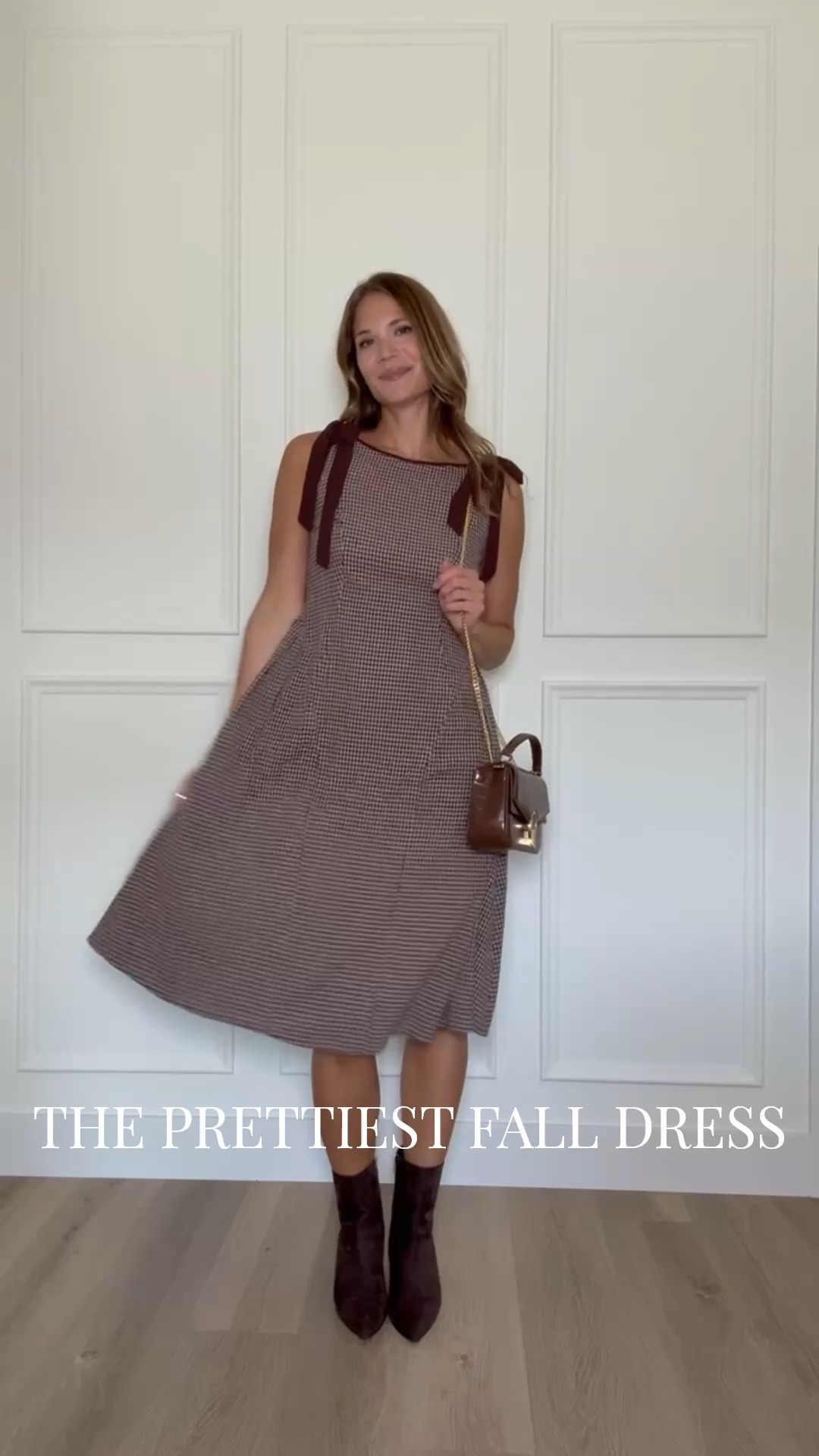 This little gingham dress has me ready for fall! I love the burgundy bow details on the shoulders, the flattering A-line shape, and how cute it looks with brown boots. Perfect for church, brunch, or a fall weekend out!
Gingham dress, Fall dress, Burgundy bow dress, A-line dress, Tall girl fashion, Tall friendly clothing, Fall outfit ideas, Brown boots, Fall brunch outfit, Feminine fall style, Casual fall dress, StangandCo