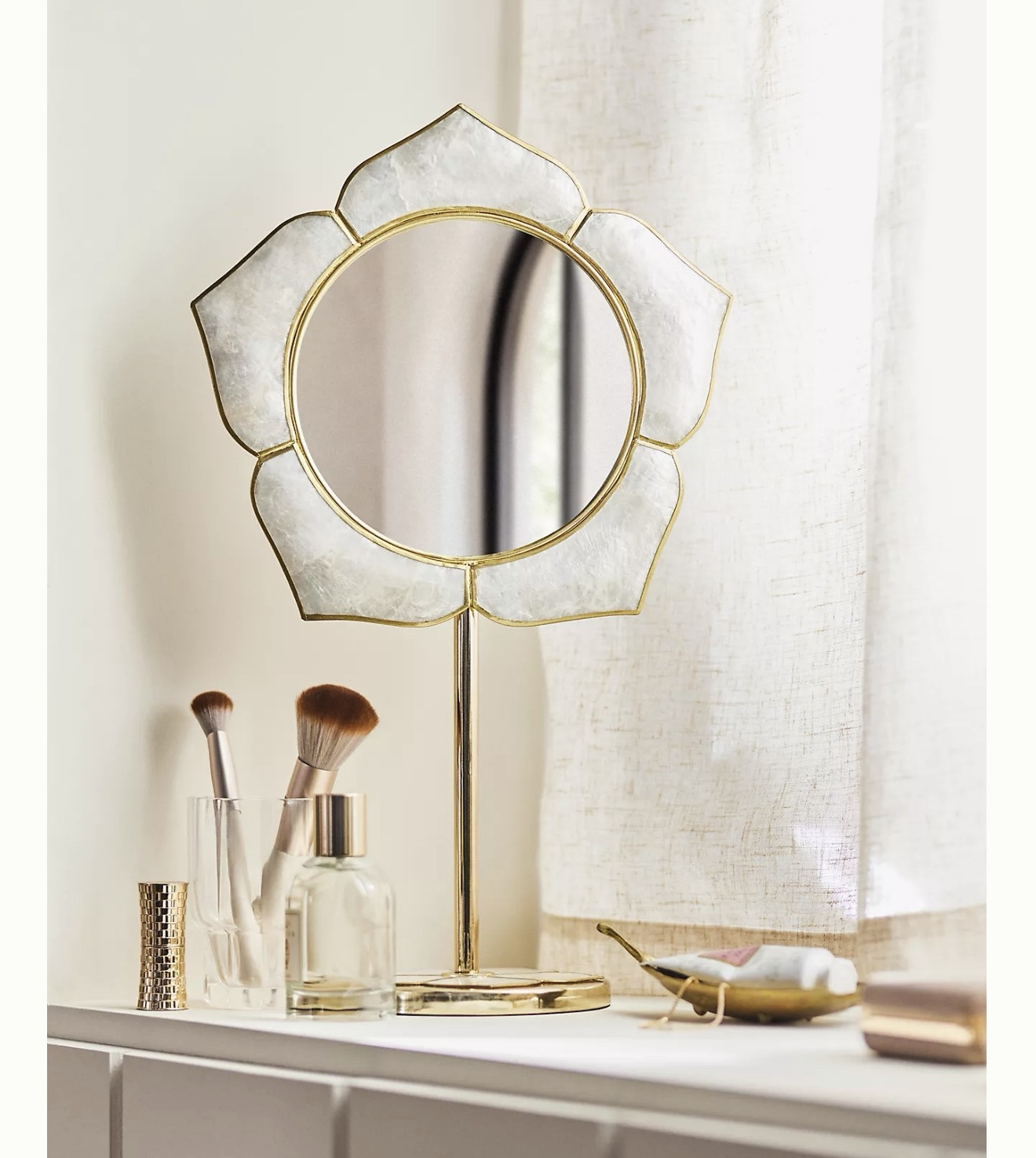 Azalea Capiz Flower Vanity Mirror


#LTKHome #LTKmomlife #LTKSeasonal