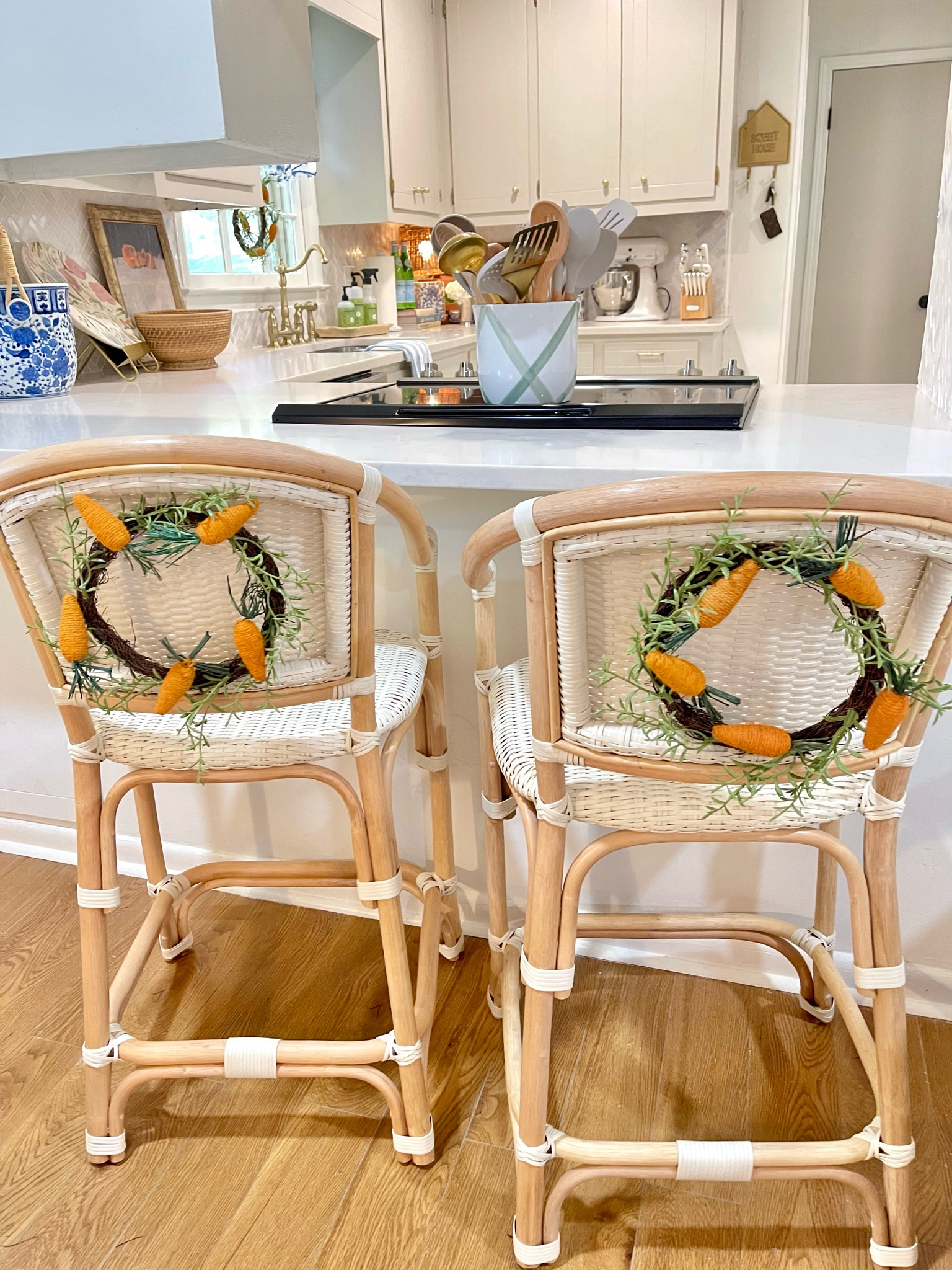 Rattan bar stools all decorated for Easter 🥕🐣 wreaths from Target dollar spot!

#LTKhome #LTKSeasonal #LTKFind