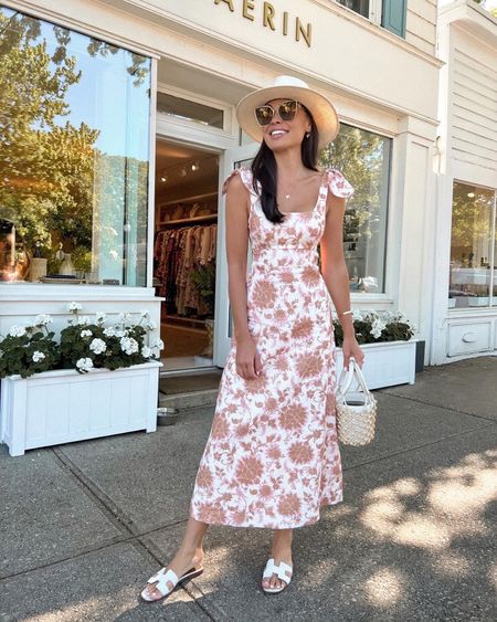 Kat Jamieson wears a classic neutral midi dress perfect for summer. Summer dress, neutral style, white dress, classic outfit.

#LTKSeasonal #LTKstyletip