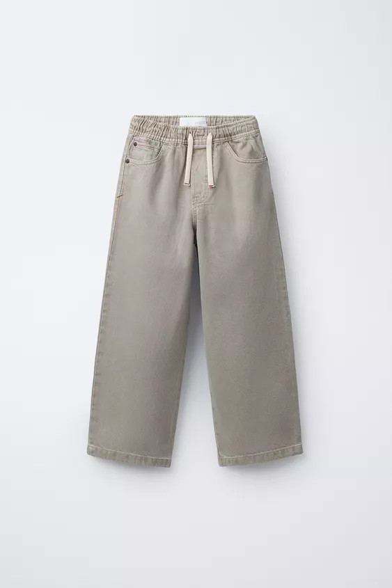 Baggy trousers with an elastic waistband and adjustable front drawstrings. Featuring front pocket... | Zara UK