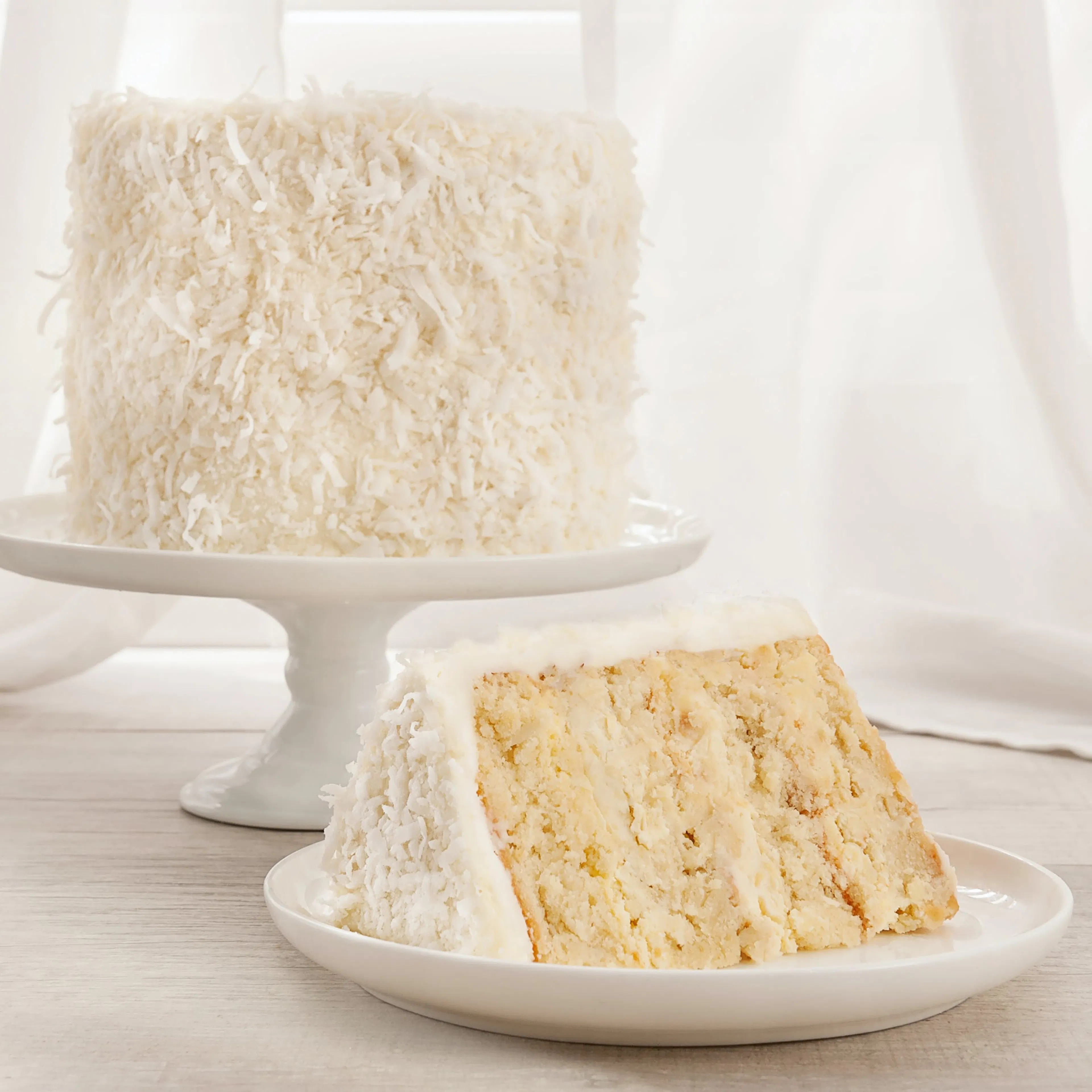 Coconut 4-Layer Cake by We Take the Cake | Goldbelly | Goldbelly