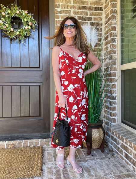 Red floral dress for spring and summer. It has beautiful button details on the bodice. The style is both feminine and sexy at the same time. The fabric is a soft polyester and the dress is fully lined with a slit at the side. I’m wearing a size Small. Nice for date nights, lunch, weddings, and more. Cute with a jean jacket topper too.
#summerfashion #midlifestyle #resortwear #outfitidea

#LTKSeasonal #LTKstyletip #LTKshoecrush