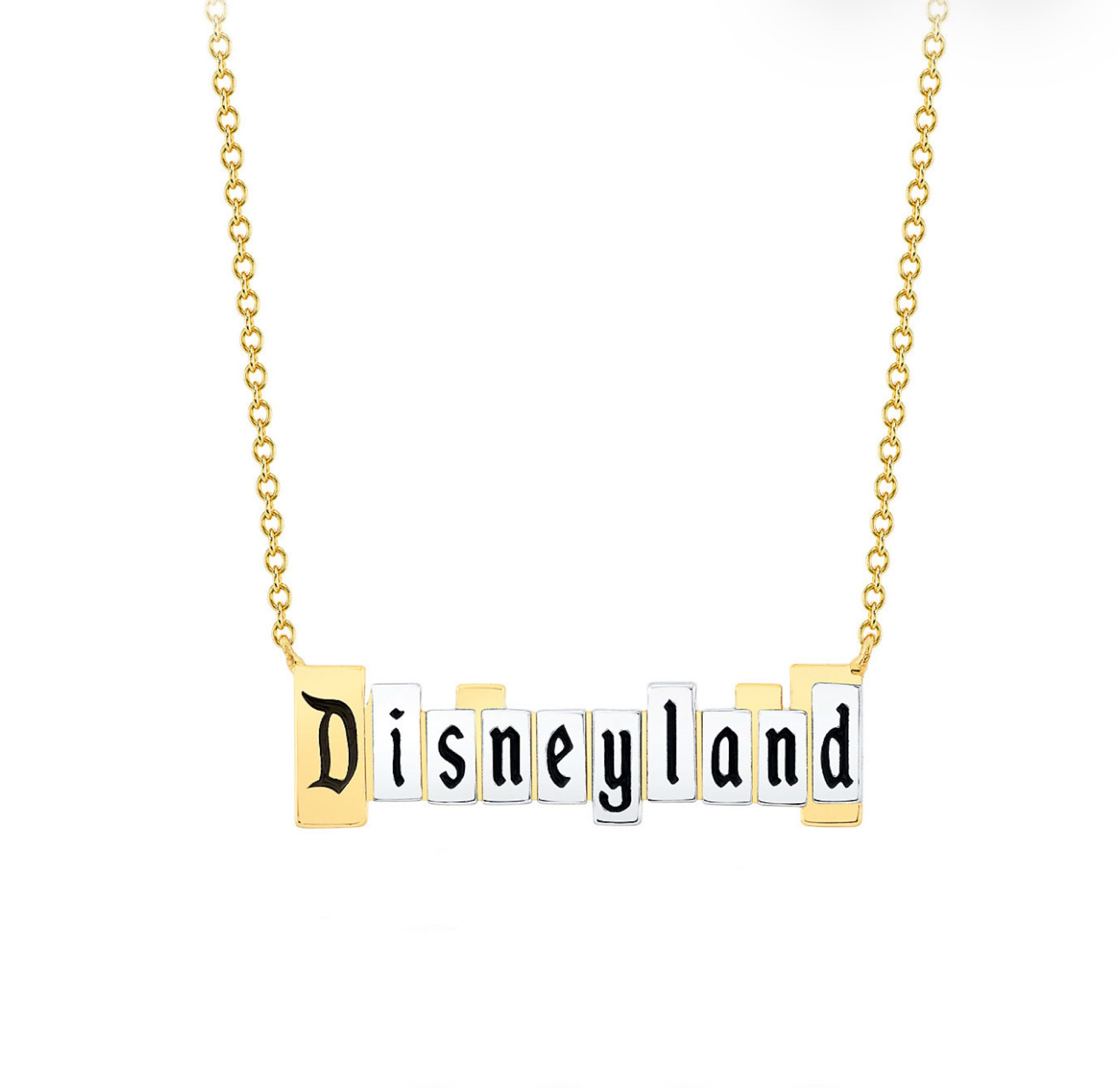 A Disneyland, marquee necklace, beautiful, and elegant with both silver and gold sold at the Disney store