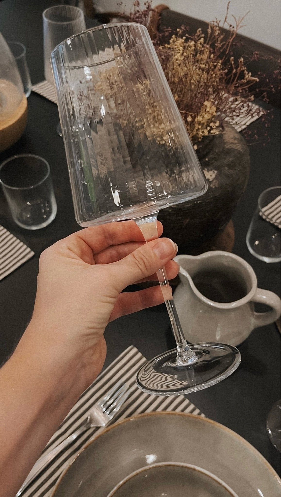 These fluted wine glasses though. 🍷 How beautiful do these look in my dining table scape?! Seriously, I’ve been looking for the perfect modern organic, transitional wine glasses with a stem and my hunt is officially over. I wanted something affordable, classy, and budget-friendly, and these are all these things. I’m absolutely thrilled with them - and they go perfectly with my stoneware dishes (which I’ve also linked here).  Who’s ready to eat?! 

#LTKFindsUnder50 #LTKSaleAlert #LTKHome