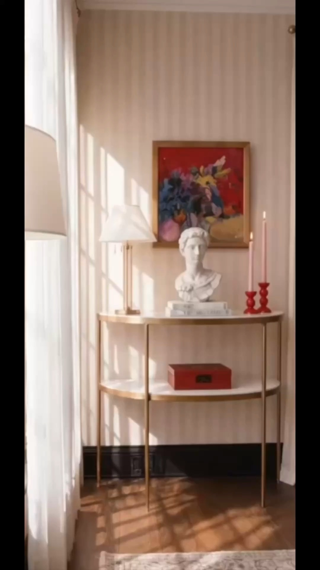 Soft morning light has a way of transforming an entryway moment into something truly special.

As the sunshine filters through the drapery, it highlights every collected detail—the statement artwork, sculptural lamp, flickering candles, glossy lacquer box, and timeless bust. Layered against striped wallpaper, this console styling creates a welcoming first impression that feels elegant, warm, and effortlessly refined.

Shop every detail in my LTK.

#EntrywayDecor #ConsoleTable #ConsoleStyling #MorningLight #TableLamp #Artwork #Candles #LacquerBox #SculptureDecor #WallpaperDecor #DraperyDesign #HomeDecor #HomeAccents #InteriorStyling #ModernClassic #CollectedHome #DesignerDetails #EntrywayInspo #LTKHome #NeutralInteriors

#LTKHome #LTKSaleAlert #LTKdayinmylife