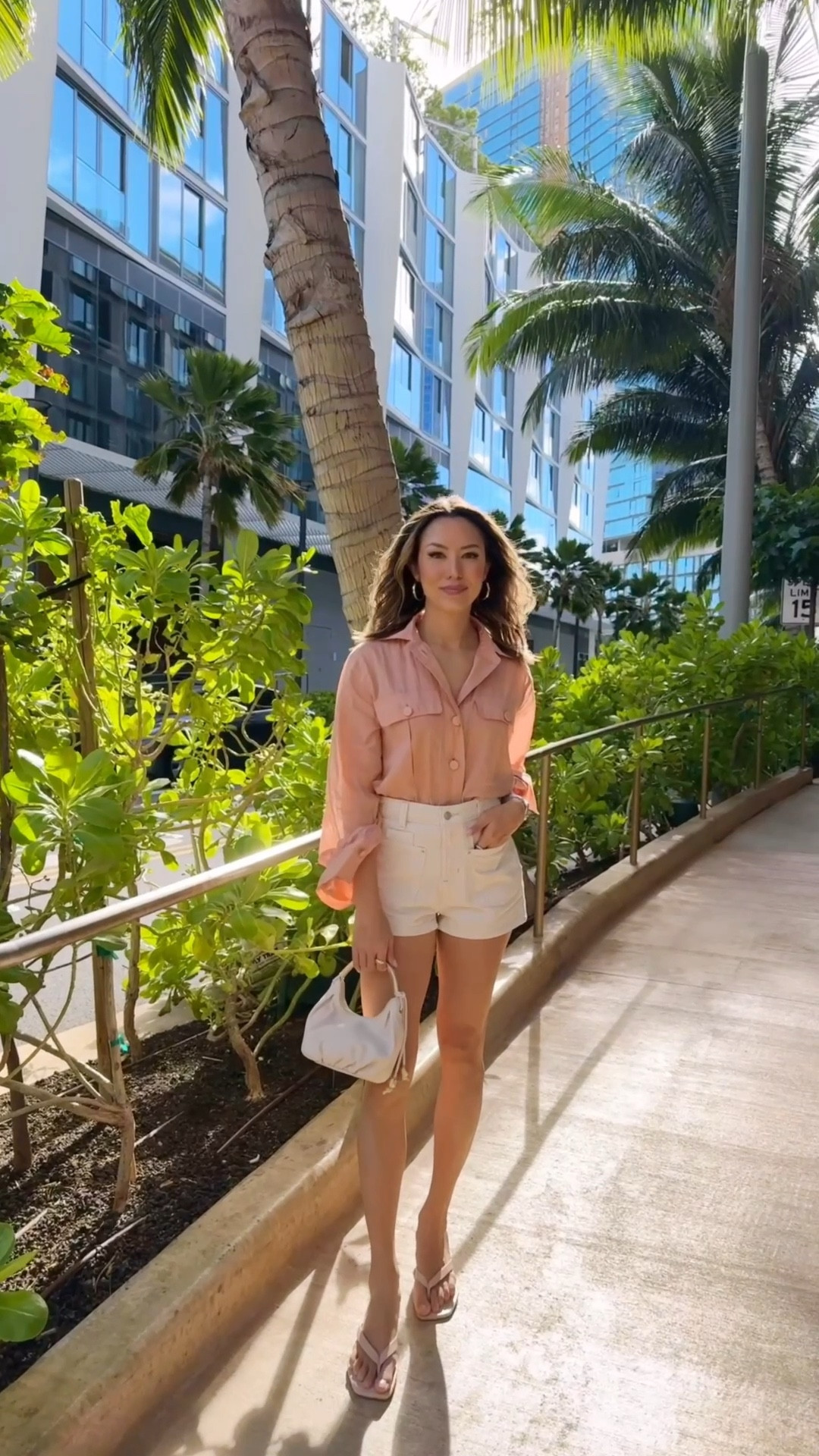 Easy summer look! My top and bag  are 20% off, wearing XS in the shirt! I would normally have unbuttoned one more button but it was so windy!! And my shorts are size 26 and under $100. These kitten heels are sooo comfy and under $100 as well

#LTKSaleAlert #LTKFindsUnder100 #LTKxMadewell