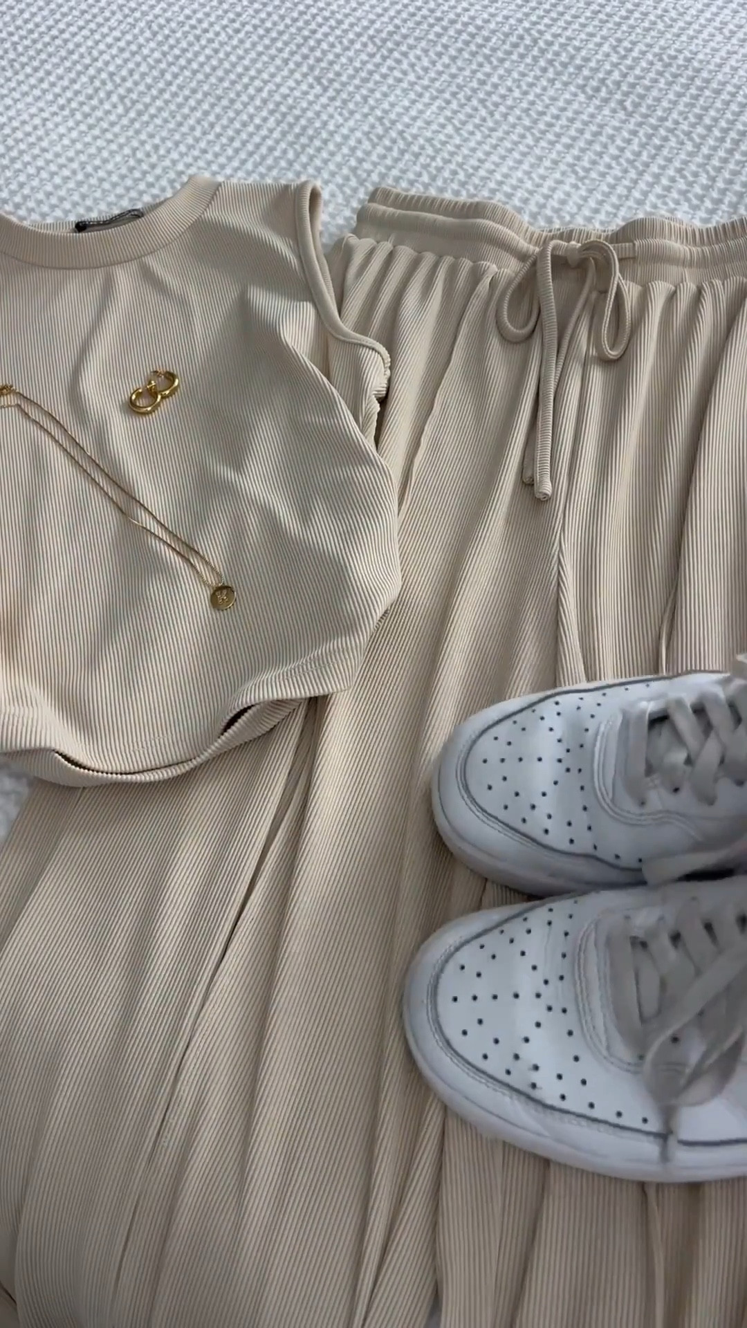 Neutral season is undefeated 🤍✨

This matching set is giving comfy, cozy, and put together 💅🏻 Styled it with crisp white sneakers, chunky gold hoops, and my everyday initial necklace for that effortless “I just threw this on” vibe 😌

Gym run, coffee stop, errands, travel day, couch reset.. this set does it all 🙌🏼 That’s the magic of a good matching set. Soft enough to lounge in, cute enough to wear everywhere ❣️

Minimal. Elevated. On repeat ✨

#AthleisureStyle #MatchingSet #NeutralOutfit #ComfyChic #EverydayStyle #ErrandsOutfit #TravelDayLook #GymToStreet #CozyVibes #EffortlessStyle

#LTKTravel #LTKmomlife #LTKSpringSale