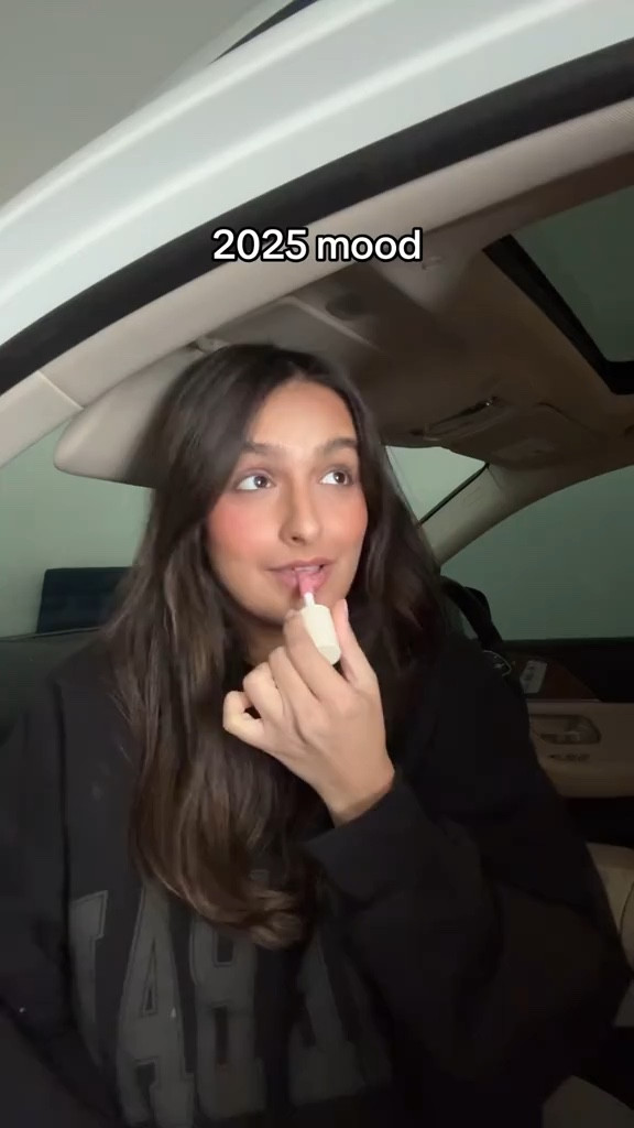 2025 mood! 🖤 

Wearing a size M in the sweatshirt and shade pink cloud gloss!

#LTKWatchNow #LTKStyleTip #LTKBeauty