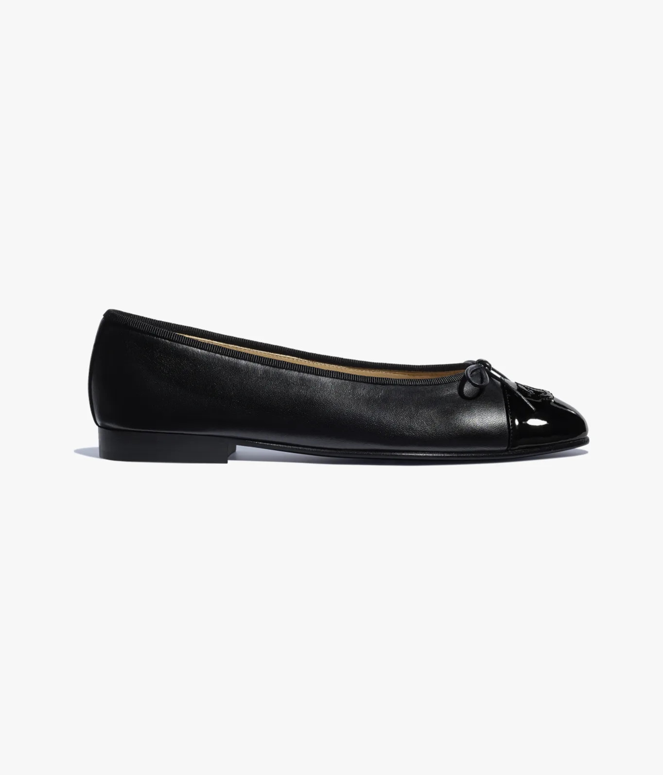 Ballet flats

            
		Lambskin & Patent Calfskin
	
		Black | Chanel, Inc. (US)