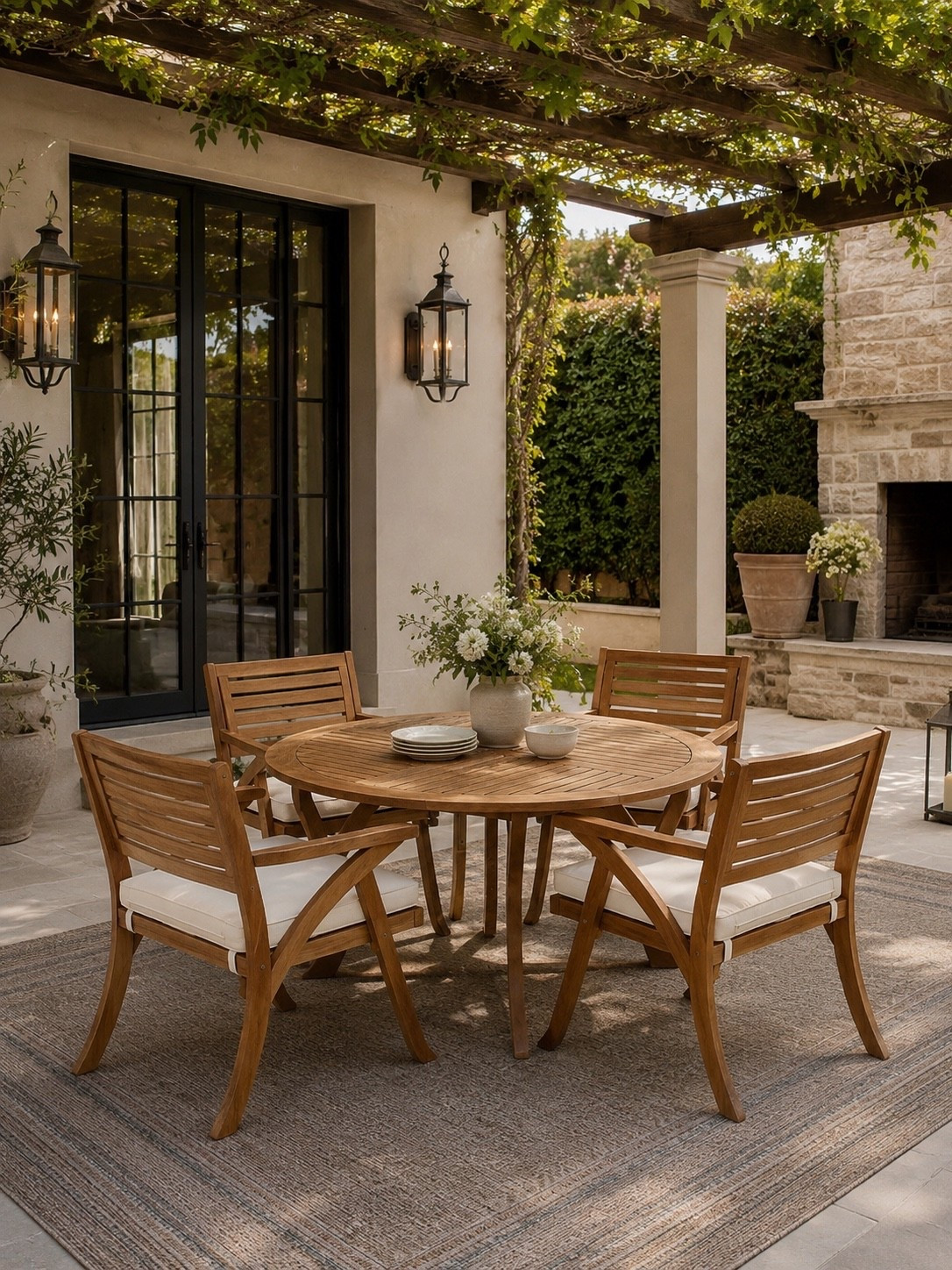 Bckyard Dining, Elevated 🌿🤍

There’s nothing quite like dining outdoors beneath a vine-covered pergola. This timeless teak dining set brings warmth, charm, and effortless elegance to any patio, creating the perfect setting for morning coffee, casual family dinners, or weekend gatherings with friends.

The natural wood finish, comfortable cushioned seating, and classic round table make this set both beautiful and functional. Paired with soft greenery and a cozy outdoor rug, it creates an inviting space you’ll enjoy season after season.

Follow @farmtotablecreations on Instagram for more cozy, elevated home finds and outdoor living inspiration. 🤍

#LTKHome #OutdoorDining #PatioDecor #BackyardGoals #OutdoorLiving #AlFrescoDining #PatioFurniture #BackyardInspiration #OutdoorEntertaining #GardenStyle #EuropeanFarmhouse #HomeDecorFinds #OutdoorOasis #SummerHosting #LTKStyle

#LTKSaleAlert #LTKHome