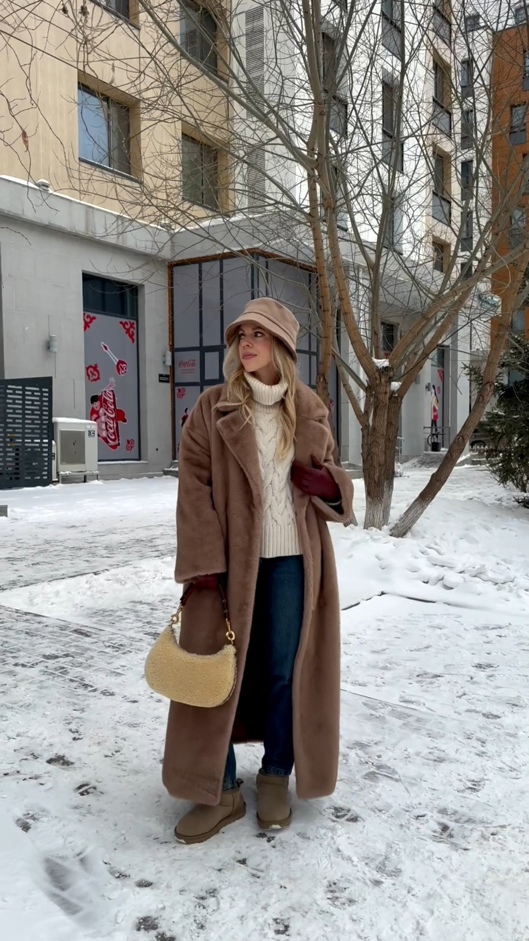 Camel fur coat, cable knit sweater, shearling handbag, Zara mom jeans (perfect with Uggs and under $50)

#LTKOver40 #LTKFindsUnder100 #LTKHoliday