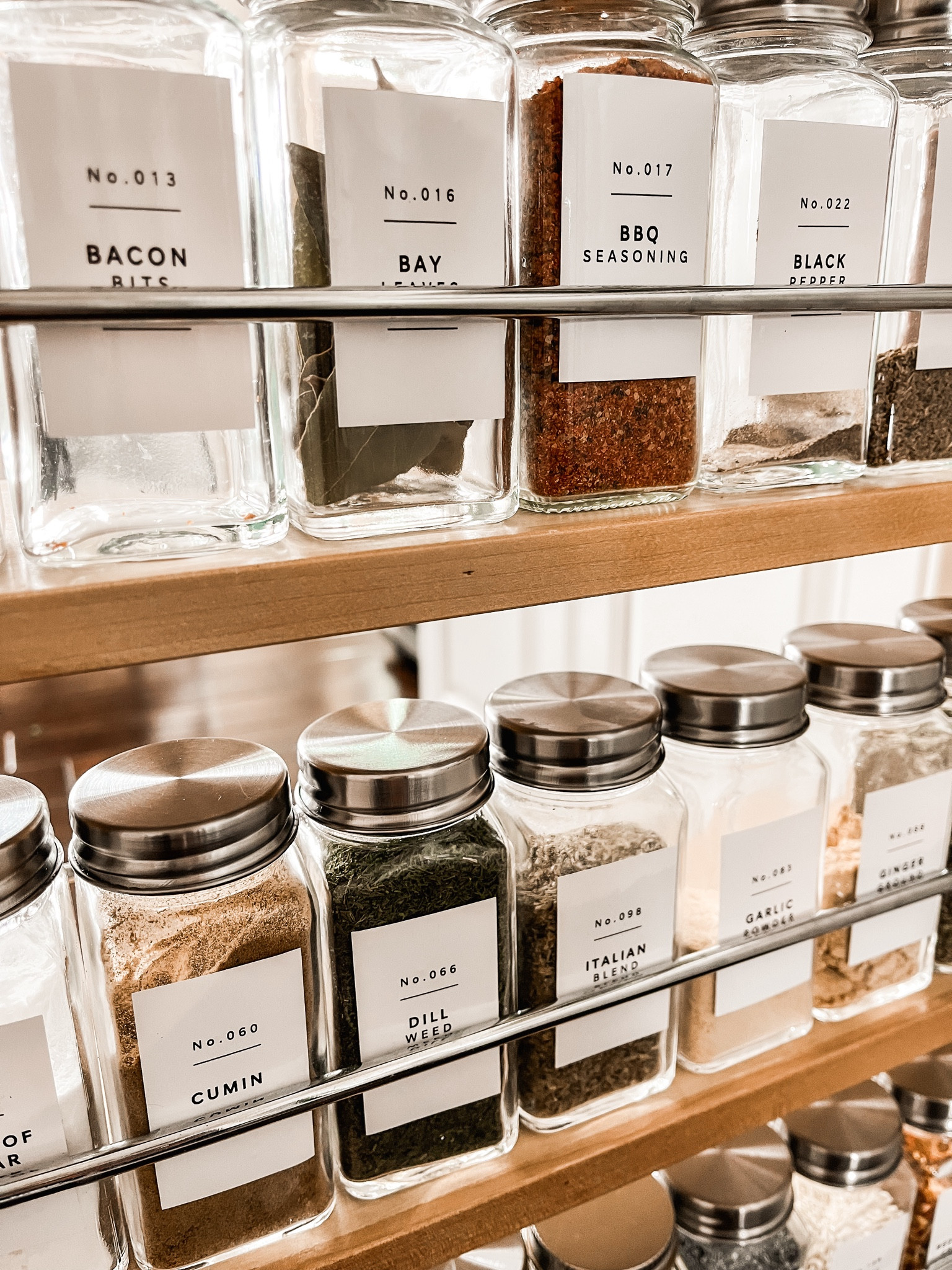 Spice jar organization with glass jars from Target & canisters from Amazon.  Modern labels are from Amazon.  Minimalist labels.  Kitchen organization, spice jar organizer, spice jar labels, modern kitchen, kitchen containers.  

#LTKMostLoved #LTKhome