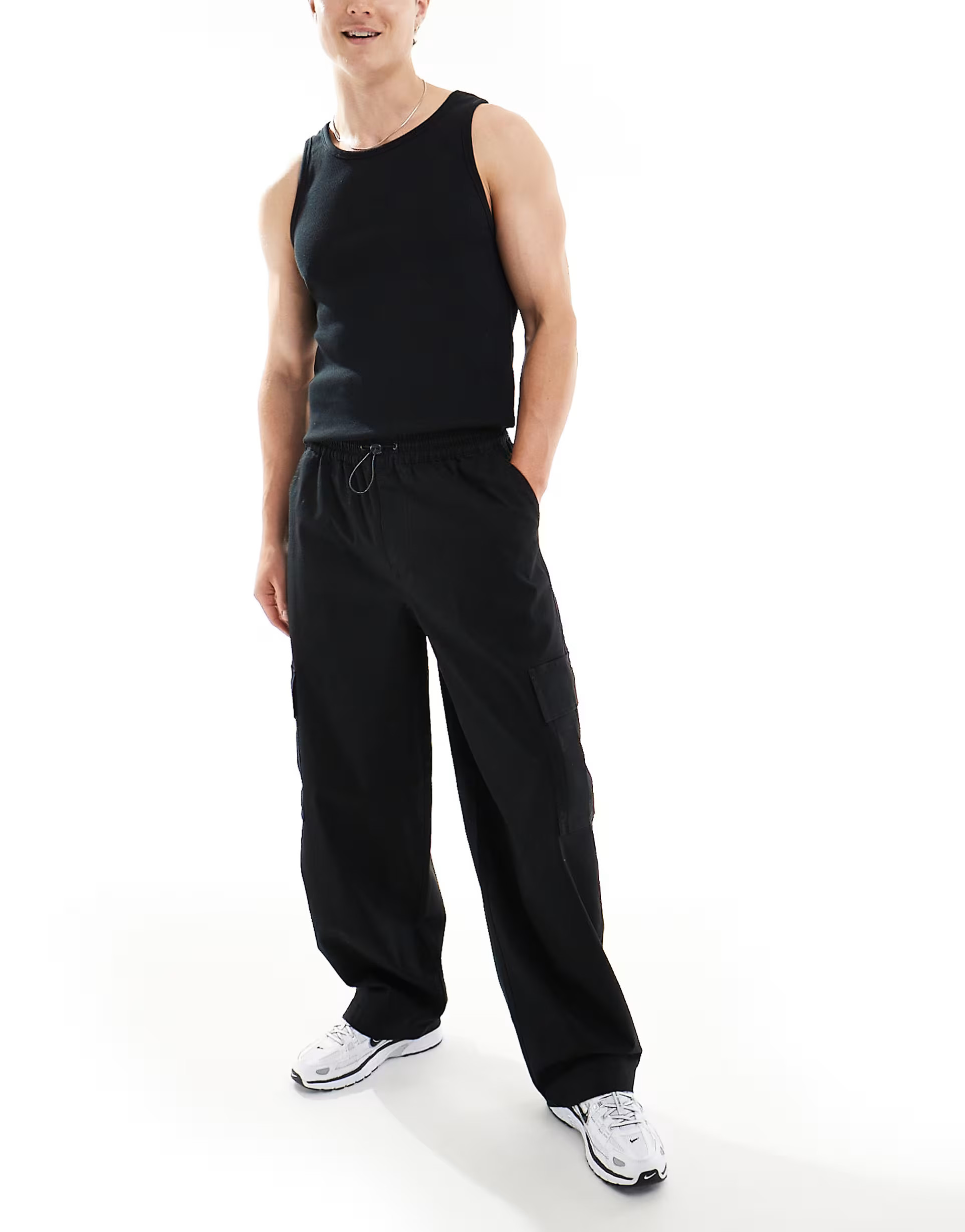 ASOS DESIGN super baggy cargo pants with elastic waist in black | ASOS (Global)