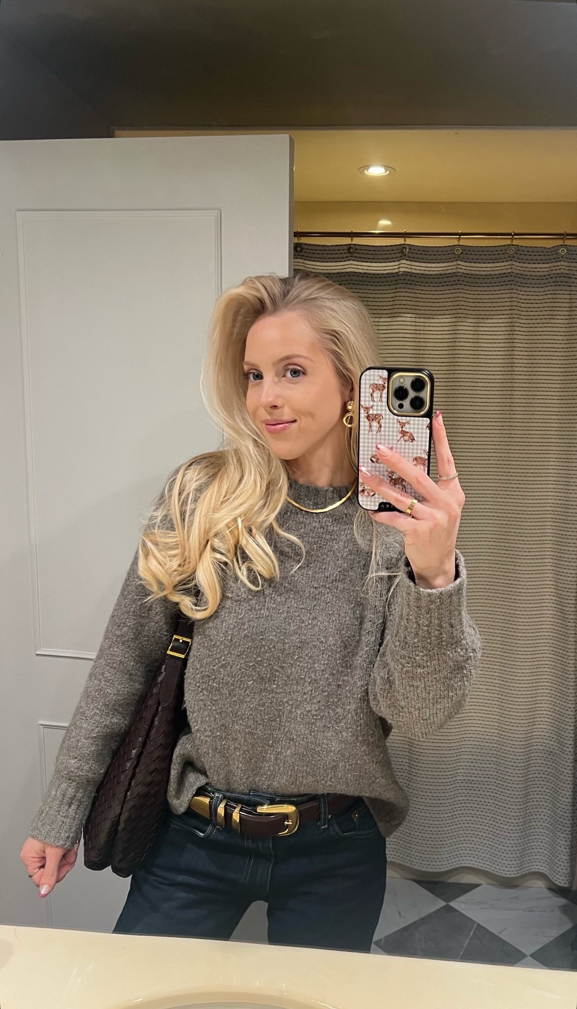 Earrings are Mango (linked a similar pair), phone case is Burga, other ring is thrifted